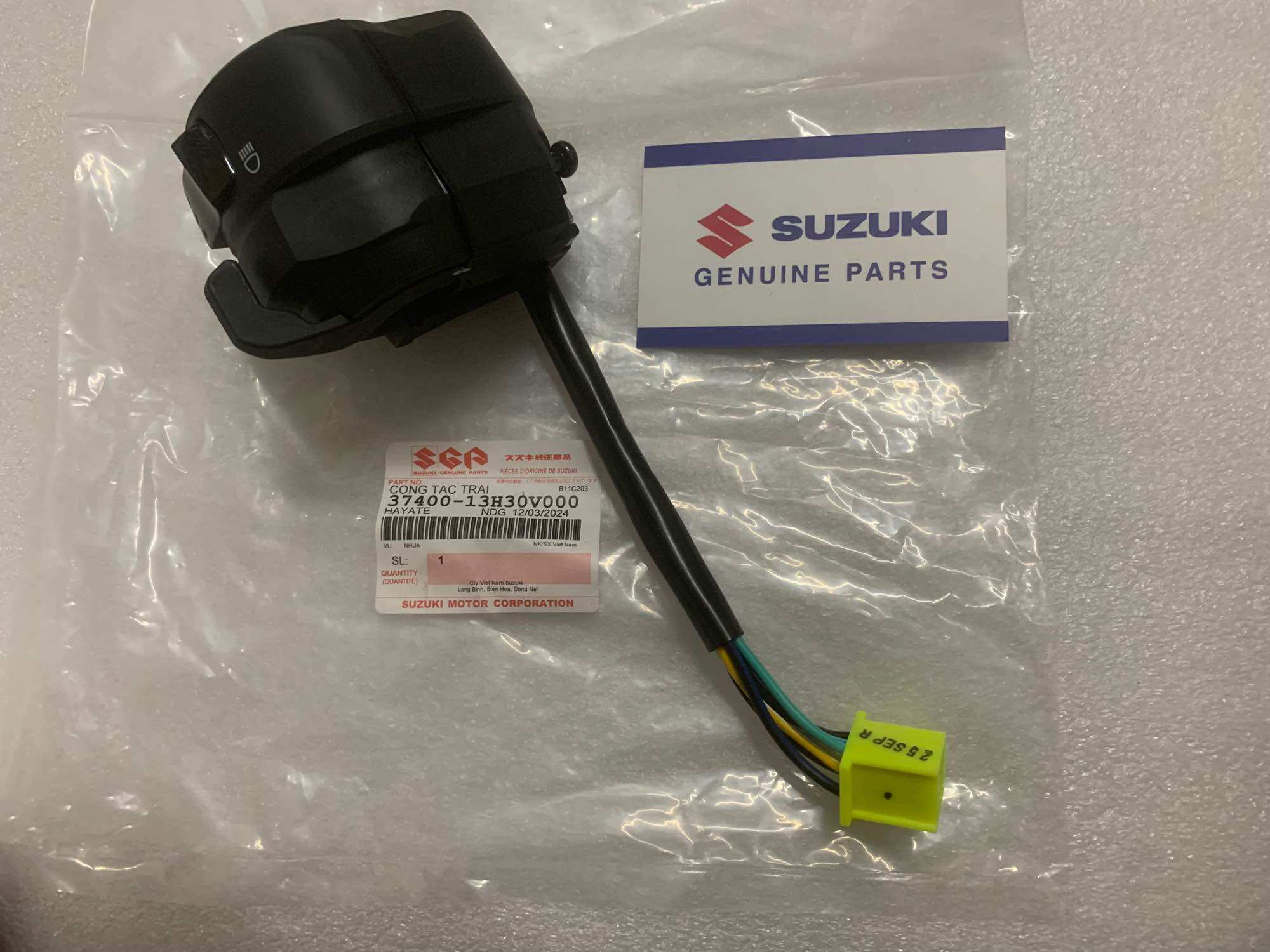 cùm công tắc trái suzuki hayate