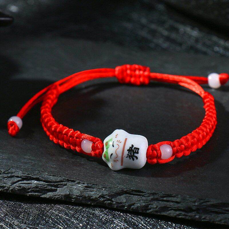 Vòng đeo tay nam nữ mèo thần tài may mắn Nhật Bản đan dây dù đỏ thời trang (1vòng)