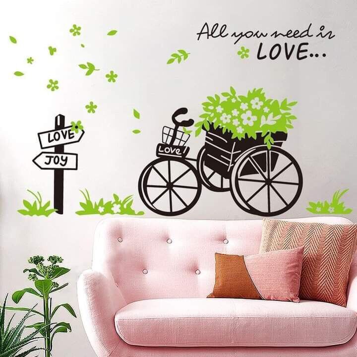 Decal dán tường xe đạp và chậu cây trên kệ