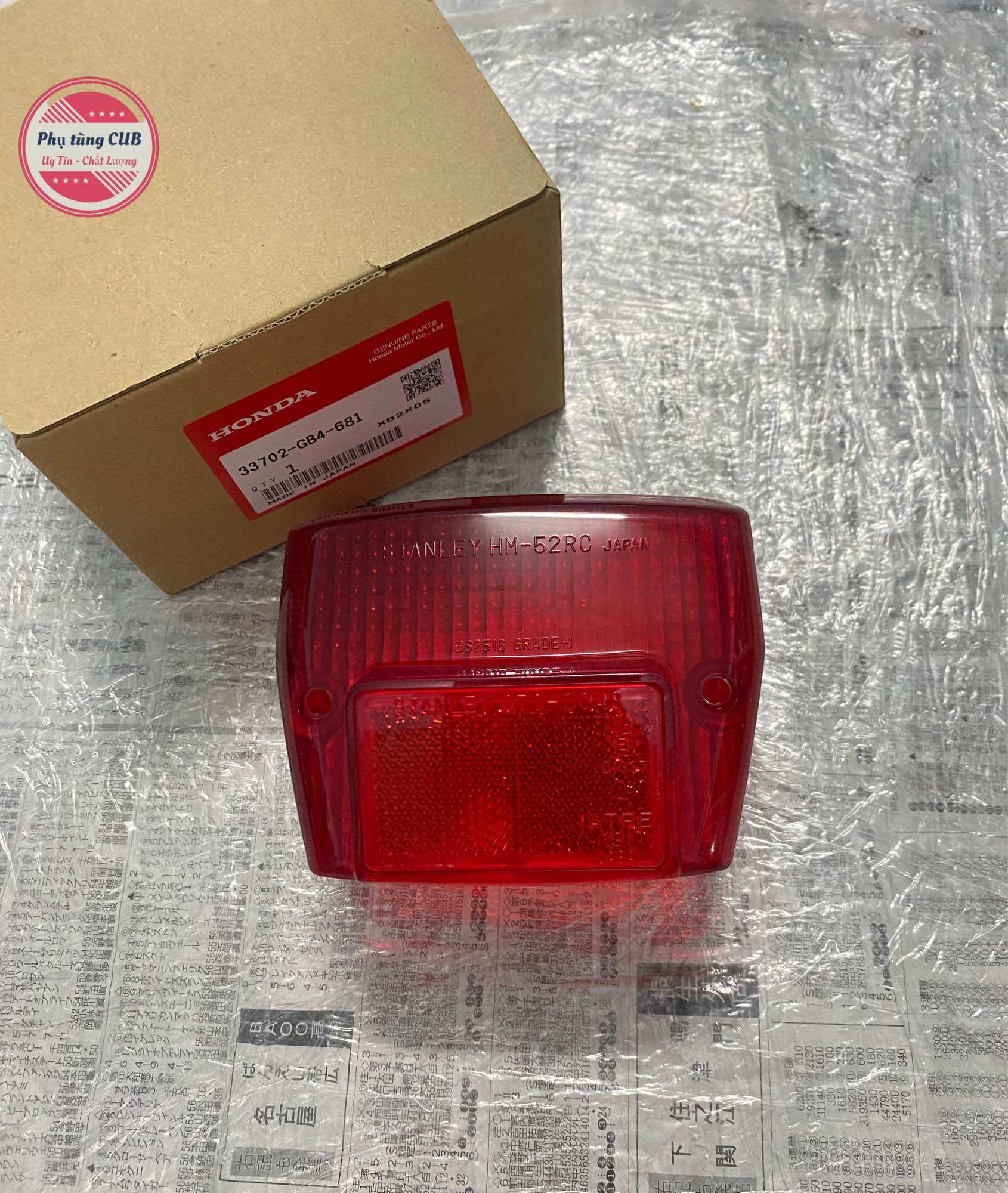 Chụp đèn hậu xe cub 82-84-dd hàng zin mới