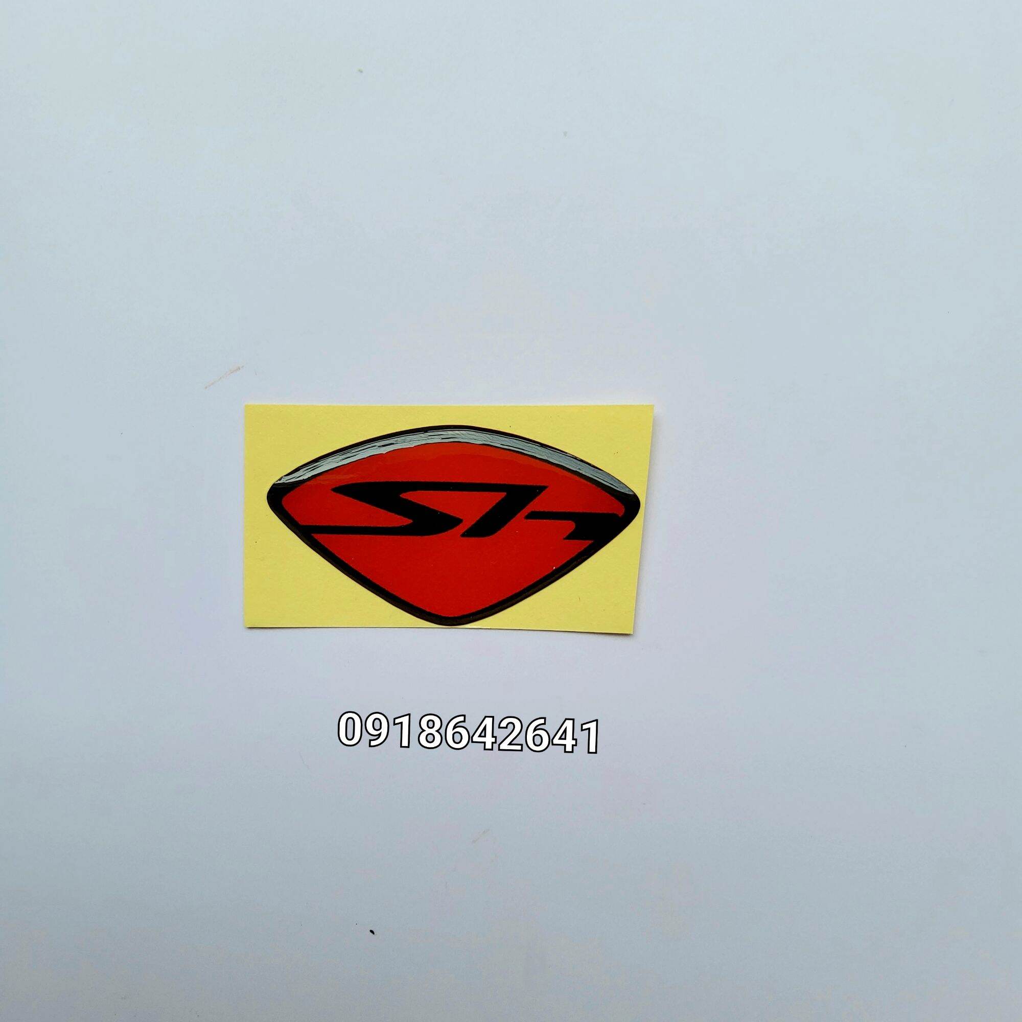 Logo mặt nạ Sh ý