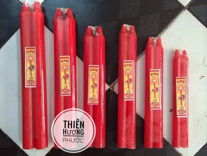 2 Red Candles Decorate the Altar