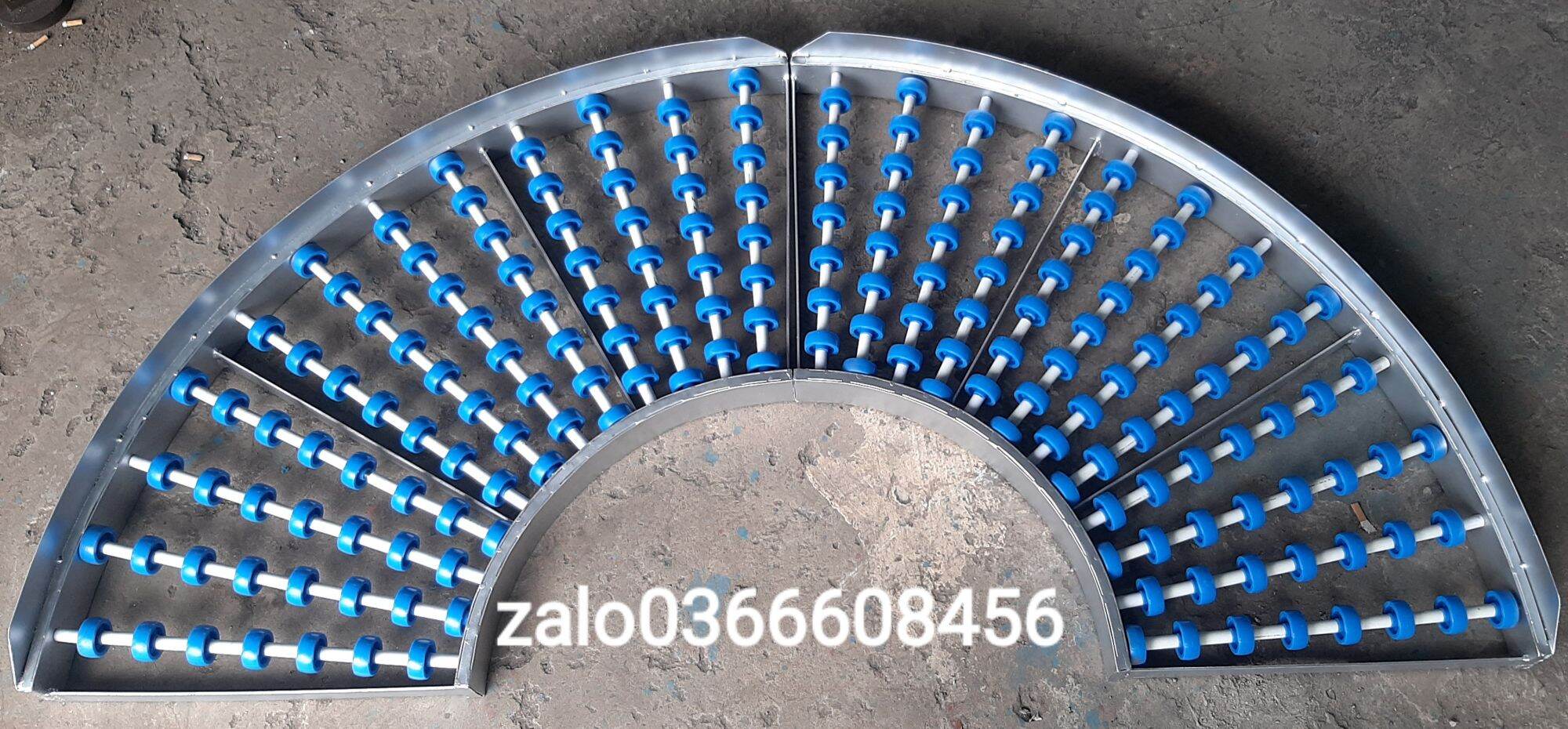 Băng tải con lăn cong 90 độ