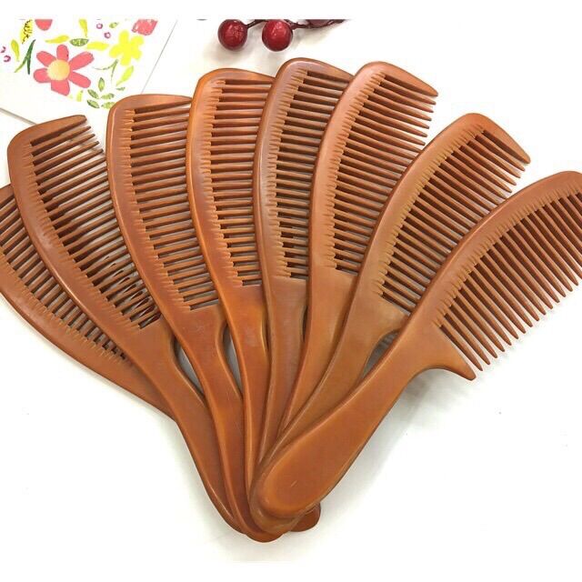 lược gỗ dùng để lấy tóc ( 1 cây )