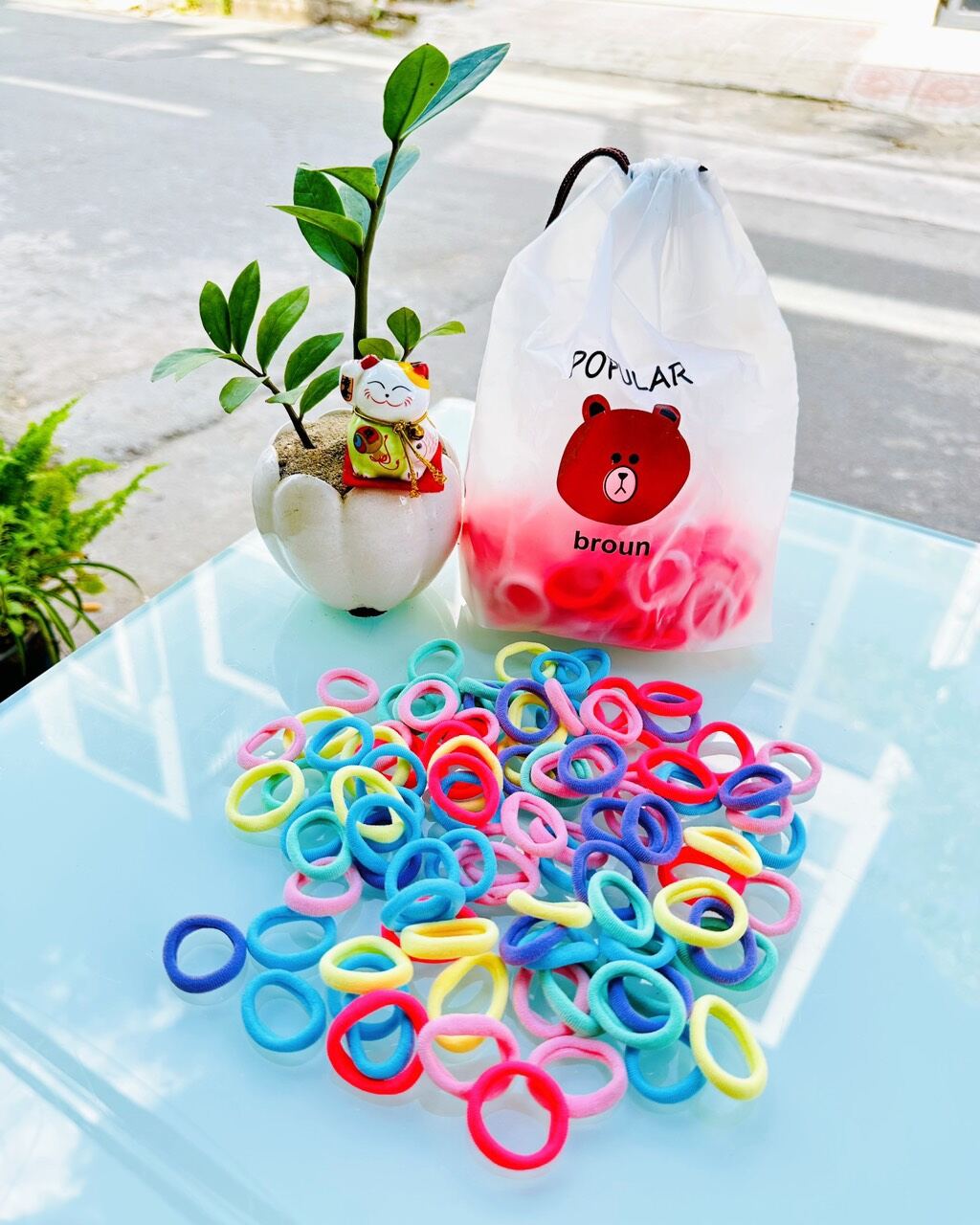 túi 100 dây cột tóc ( màu ngẩu nhiên)