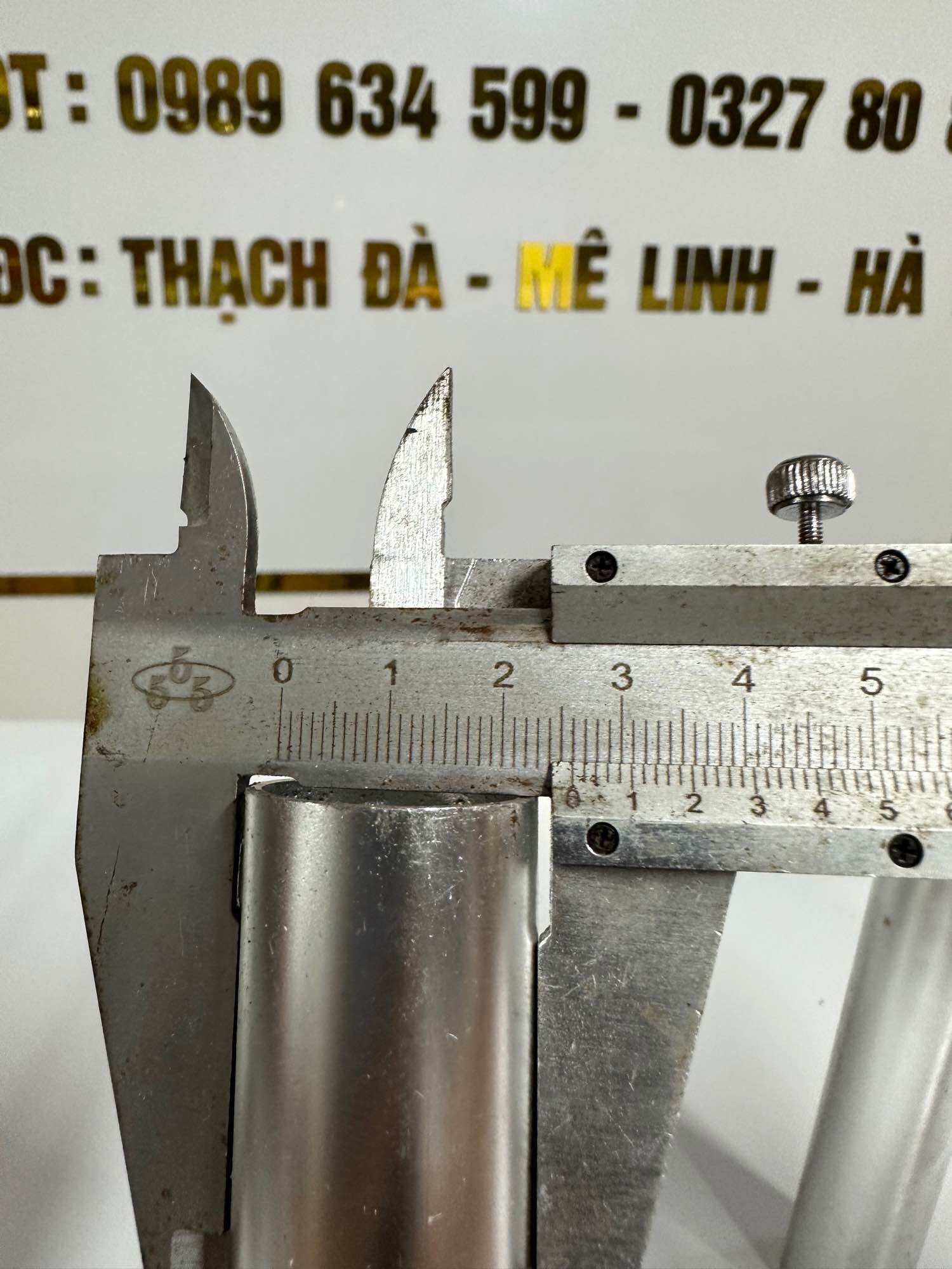Trục đầm thước. Ống dẫn hướng ty đầm thước