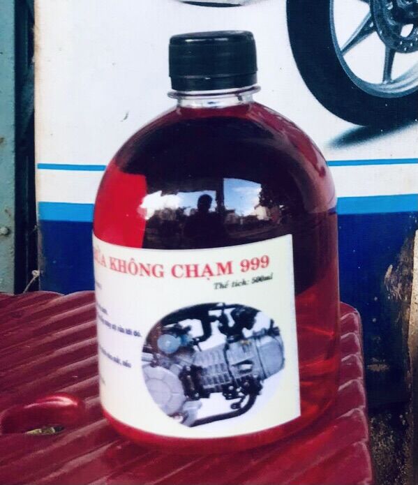 Dung dịch tẩy trắng lốc máy 999