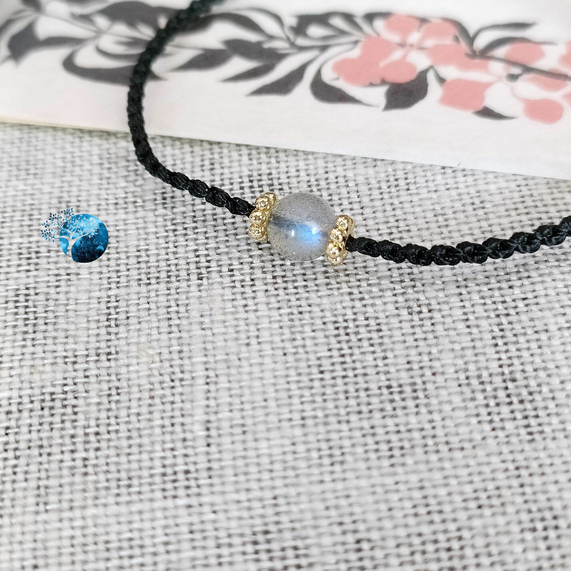 Vòng tay tết dây đá hắc nguyệt quang 5mm