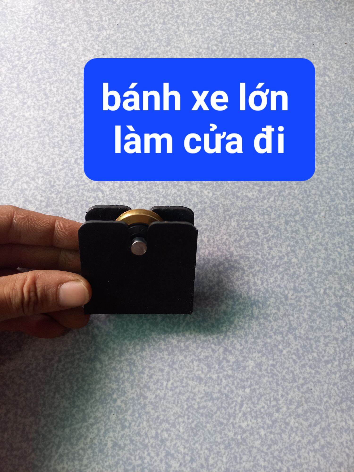 bánh xe lùa cửa nhôm