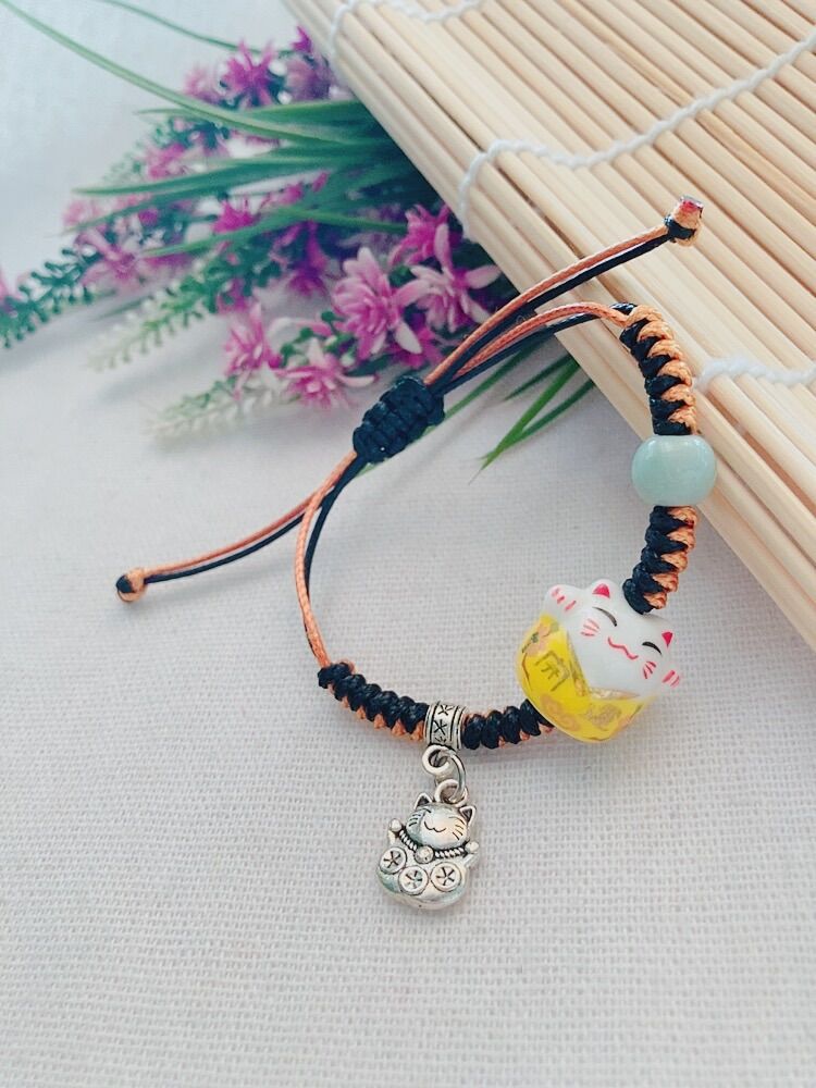 Vòng tay mèo gốm sứ may mắn