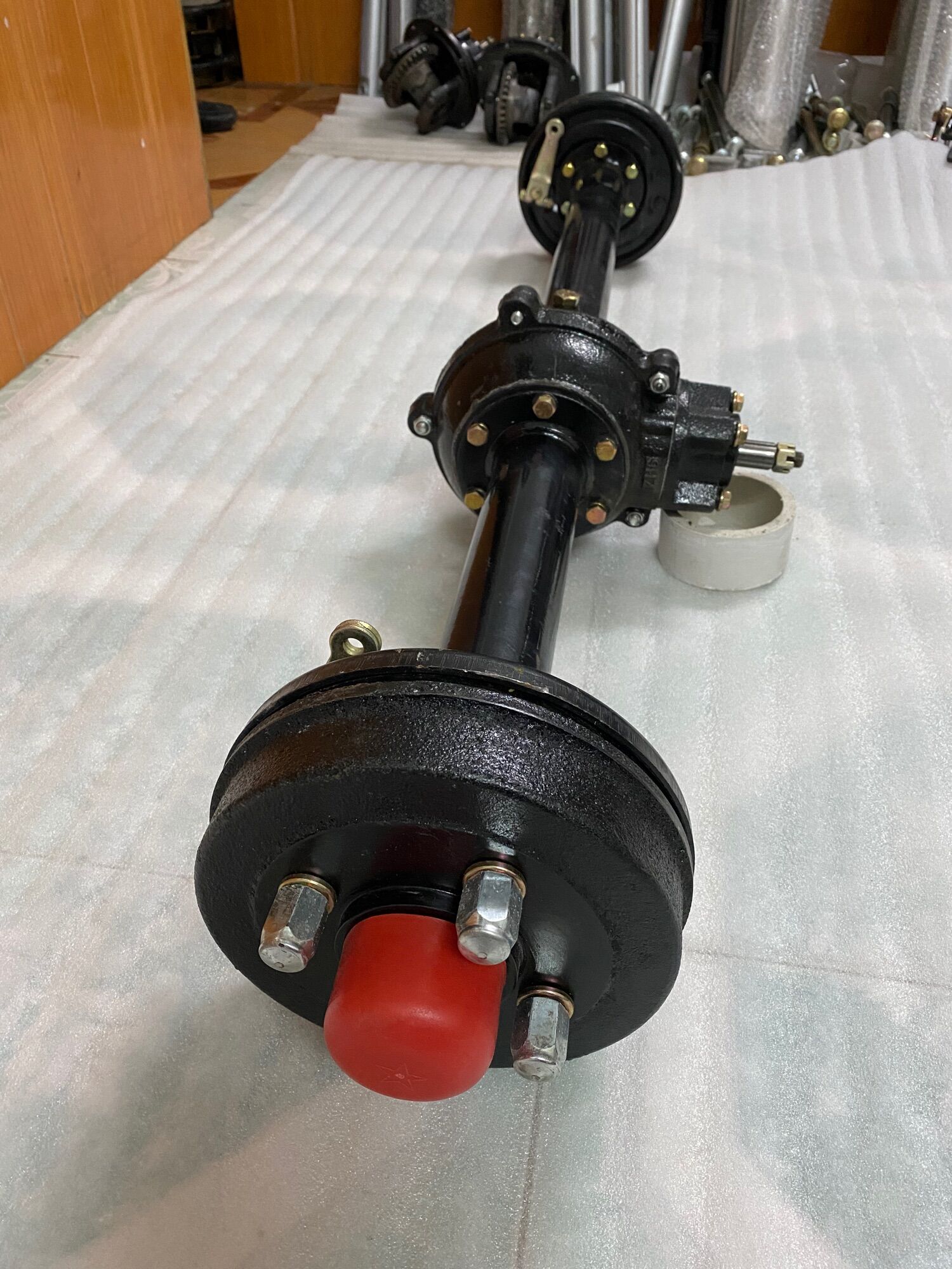 Cầu bổ đôi,cầu sọ 110cm,cầu sau xe 3 bánh,xe 4 bánh.chiều dài phủ bì cầu 110cm,kt tim ốc bắt bánh. 7cmx10cm
