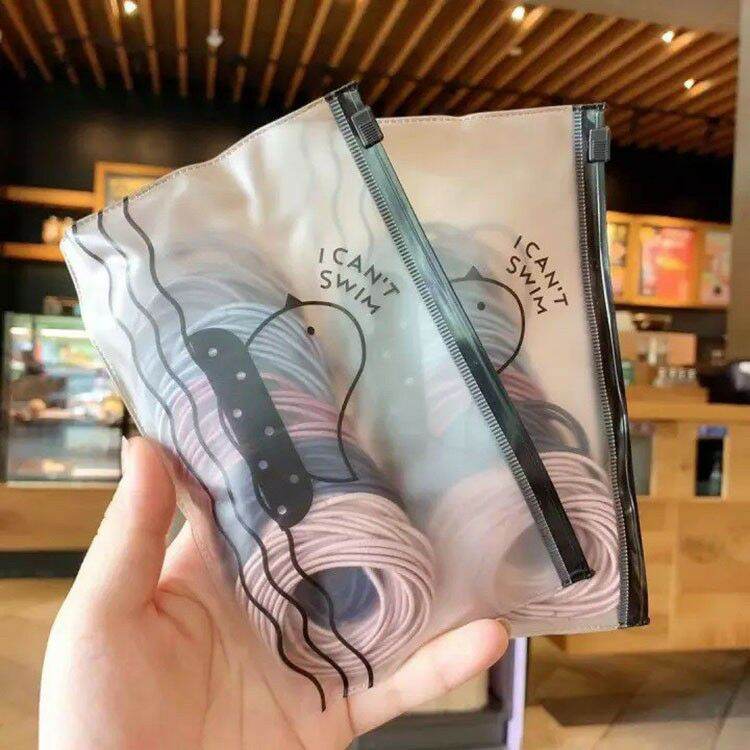set dây buộc tóc 100 dây có túi zip
