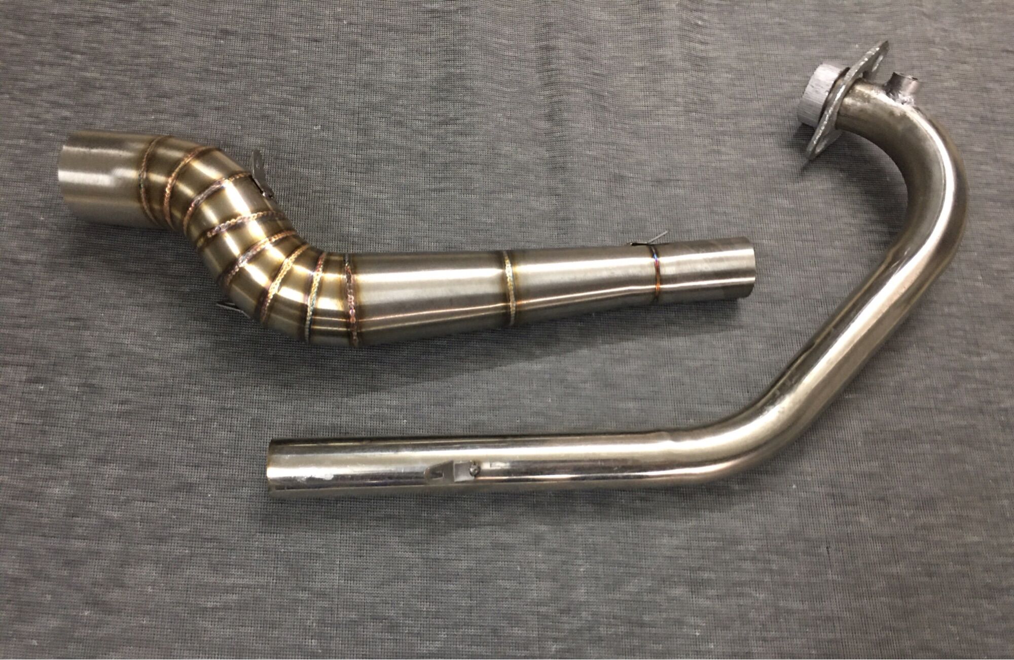 Cổ pô 2 khúc STB Satria Raider Fi gắn được tất cả các lon pô , chuẩn inox 304