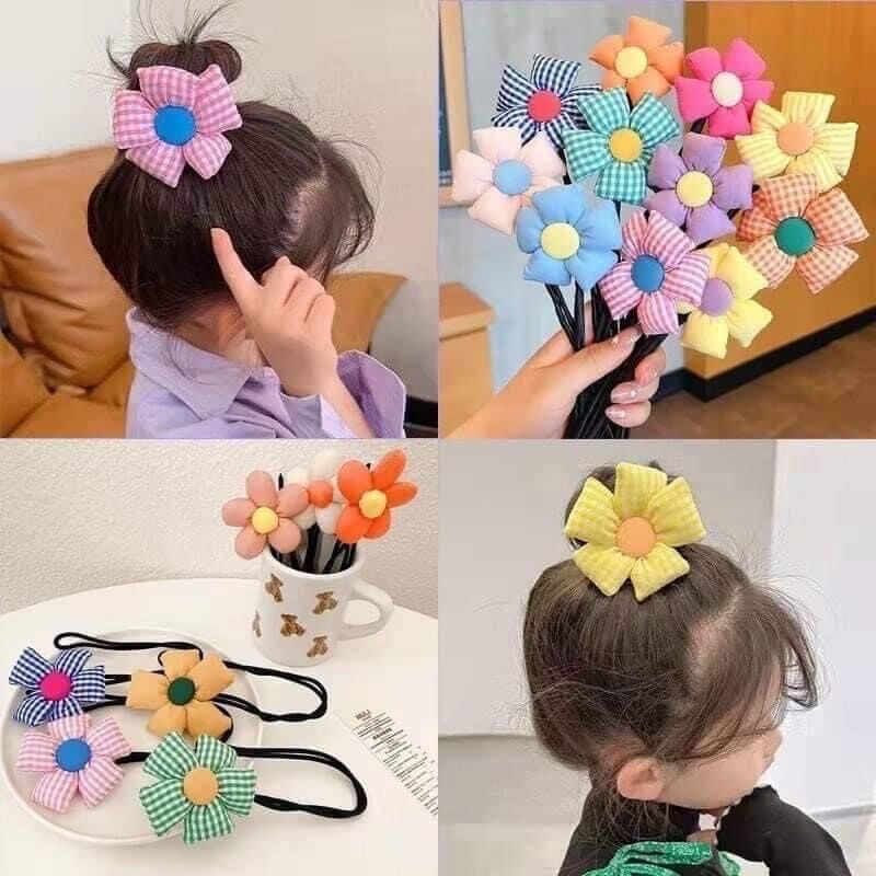 Thanh uốn búi tóc hoa bèo siêu dễ thương cho bé
