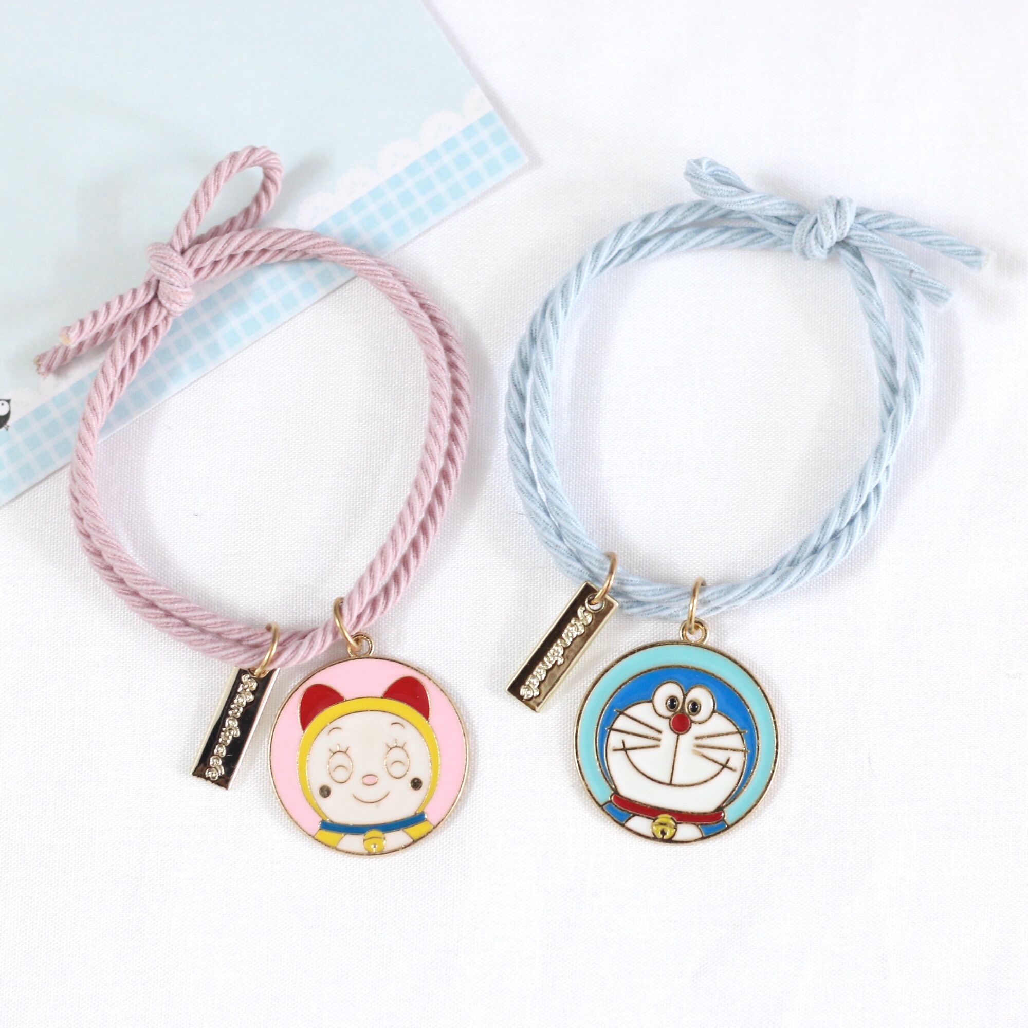 Combo 2 Dây Thun Buộc Tóc Mon Mi Tròn/Vòng Tay Doremon Doraemon