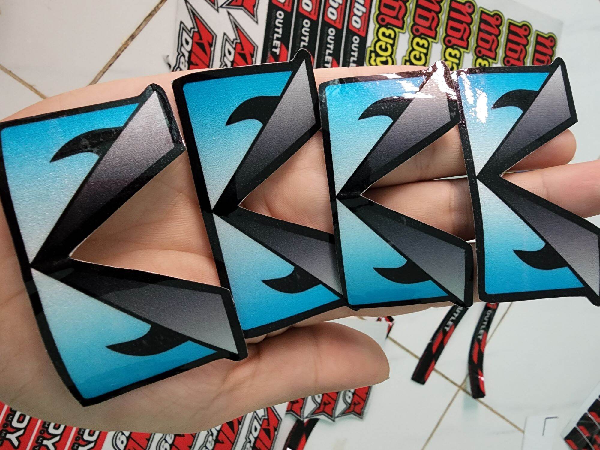 Tem logo mắt cú xanh