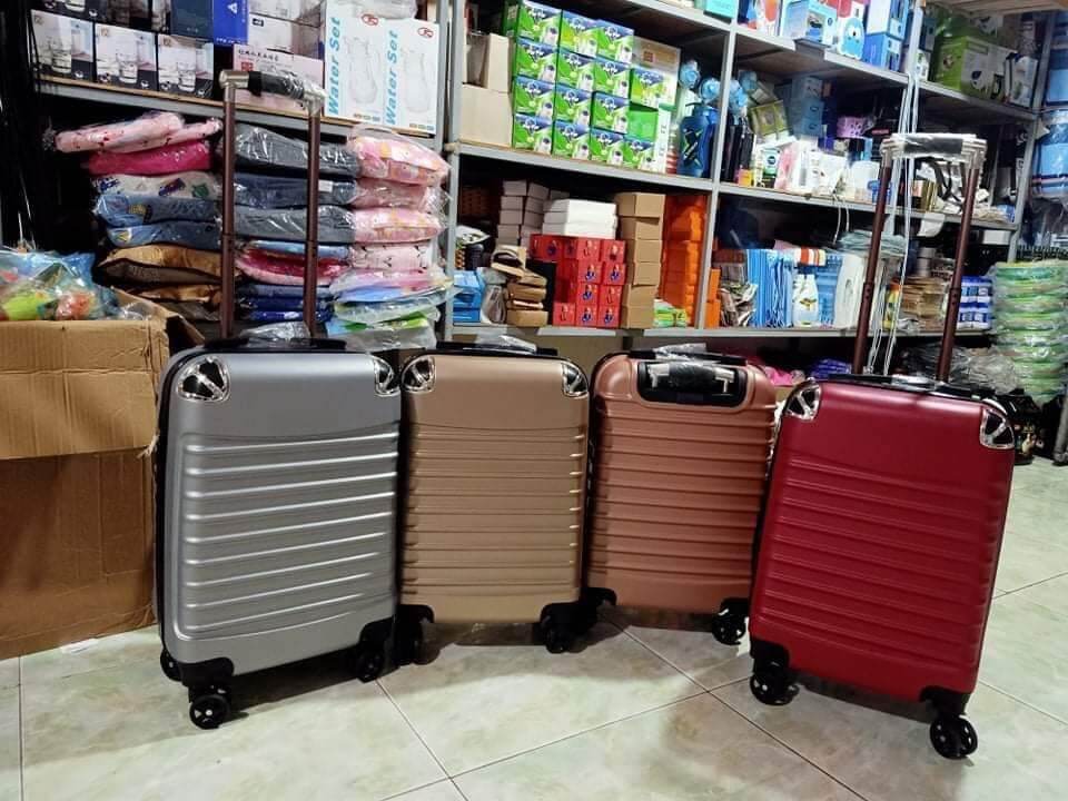 valy du lịch tay kéo có bánh xe