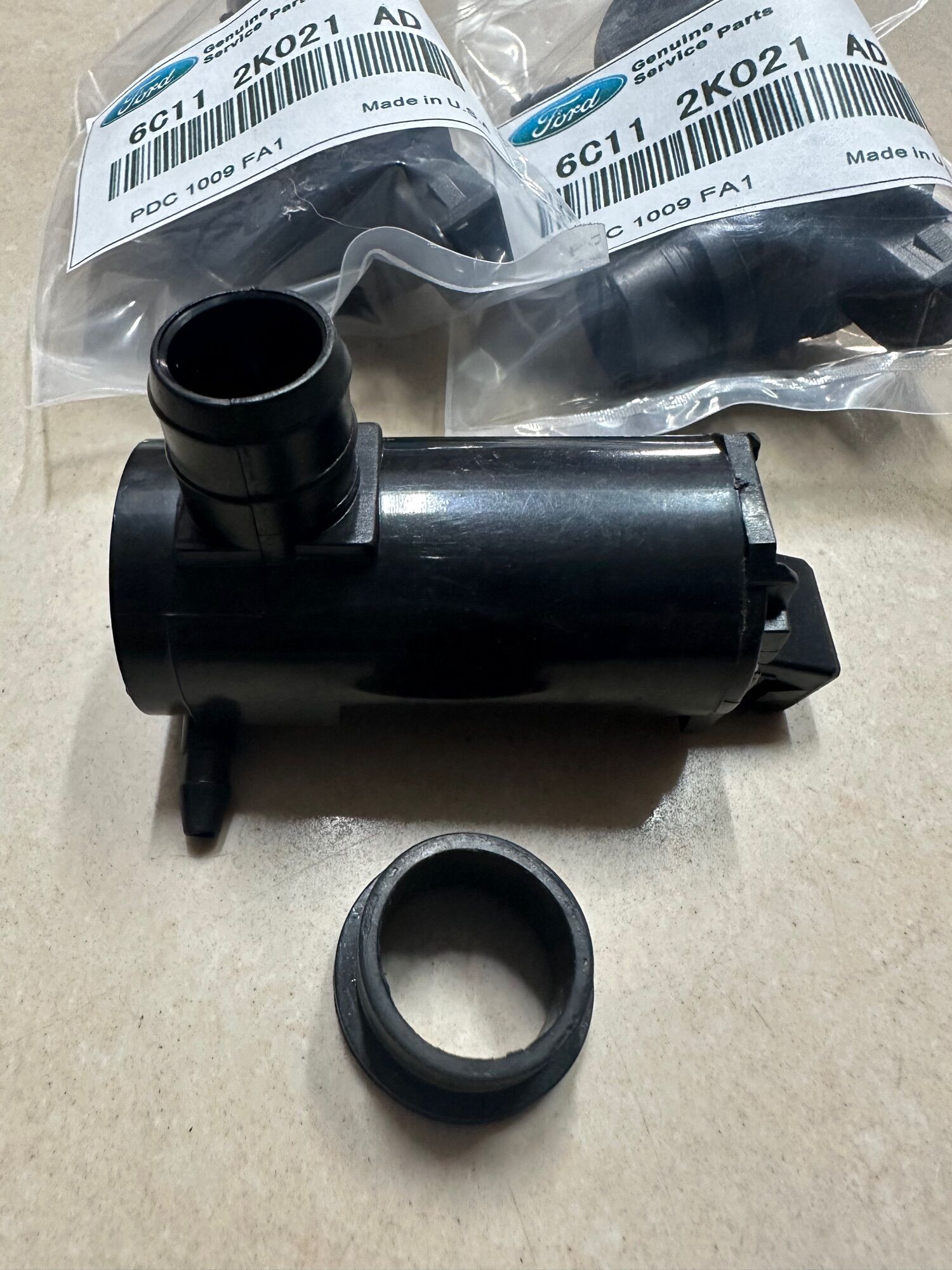 Mô tơ bơm nước rửa kính ford transit 2008-2021