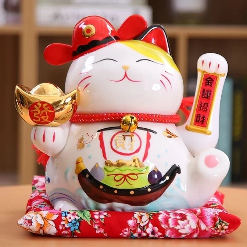 Mèo Thần Tài vẫy tay .
