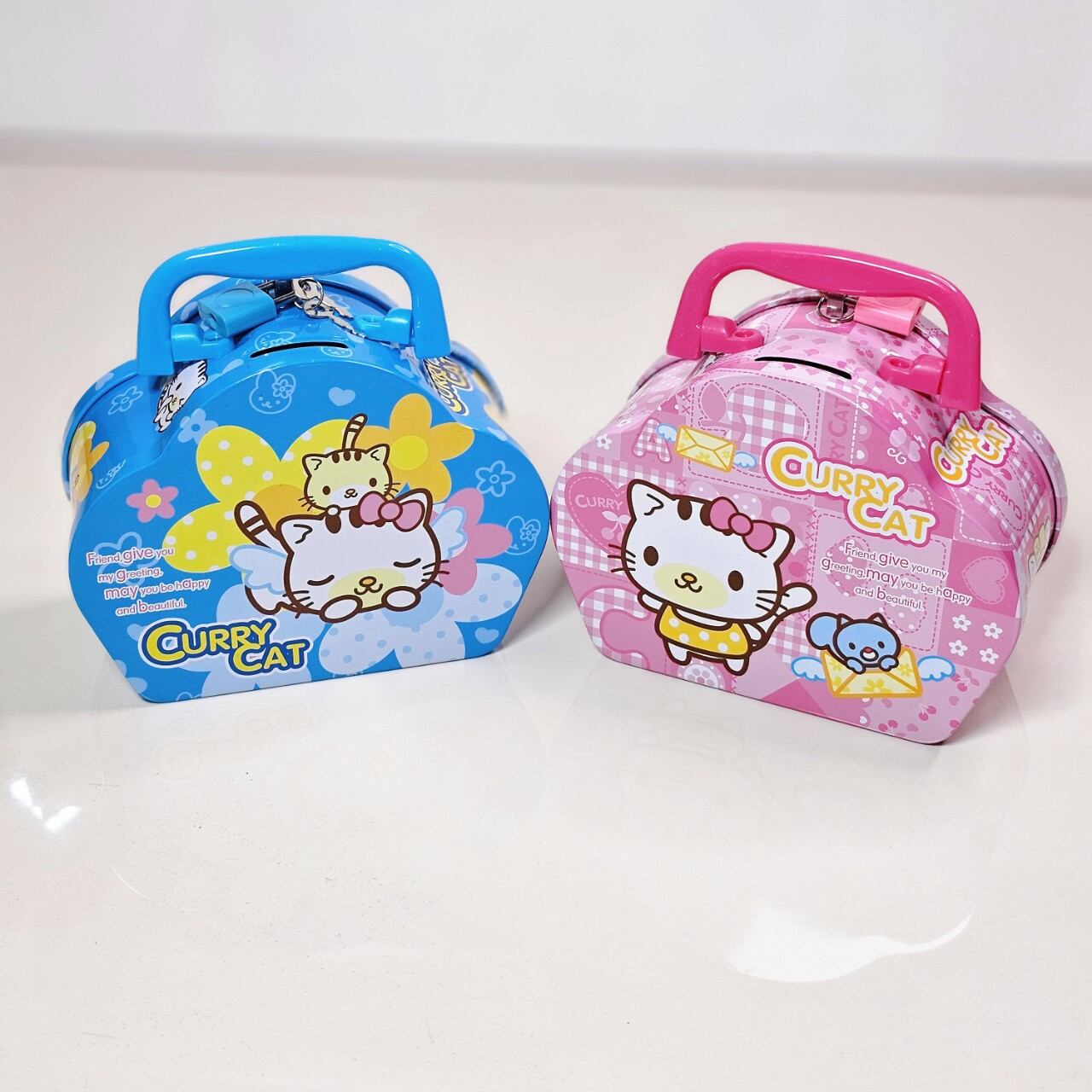 Ống heo hình Hello Kitty