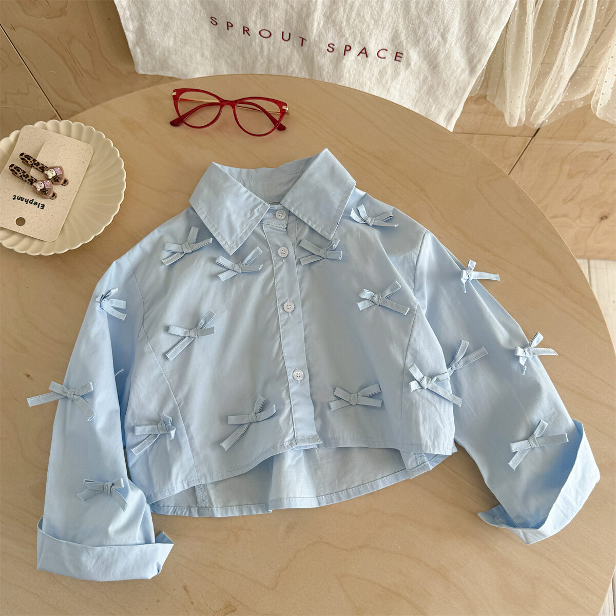 bow tie blouse with front ruffles