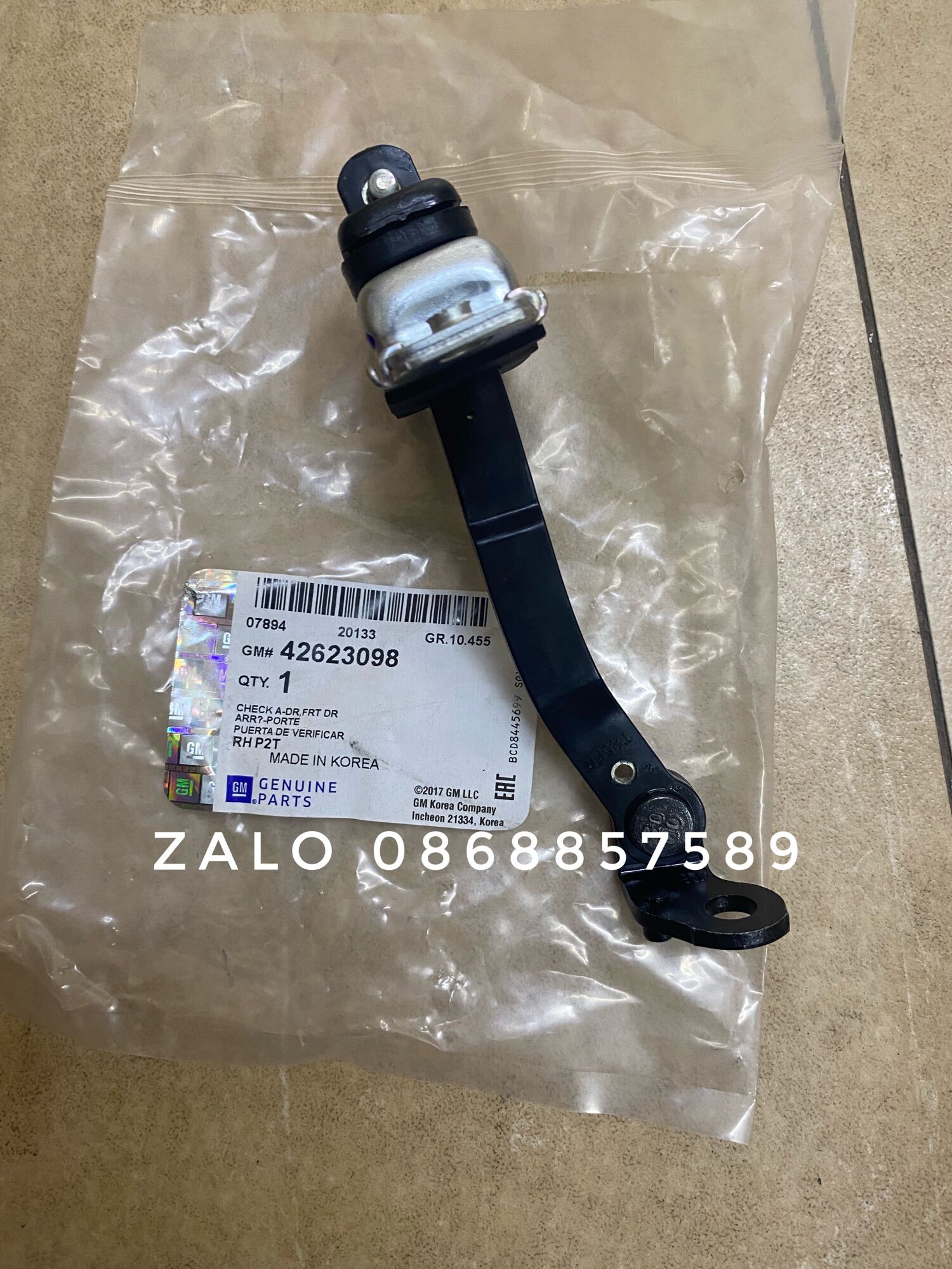 Hạn chế cửa(dẫn hướng cửa) Aveo,Gentra xịn Gm:42623097