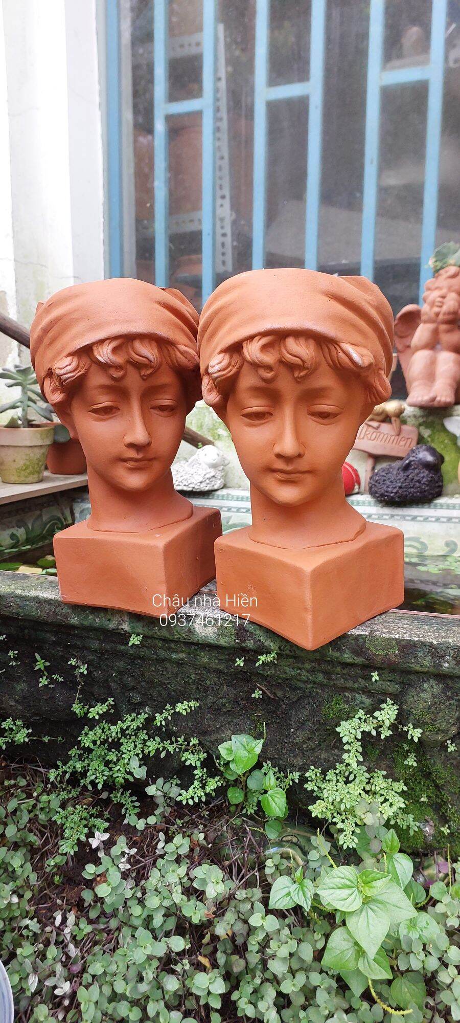 Chậu đất nung bình dương hình bé bé trai m 12.5 x 8.5, c23cm
