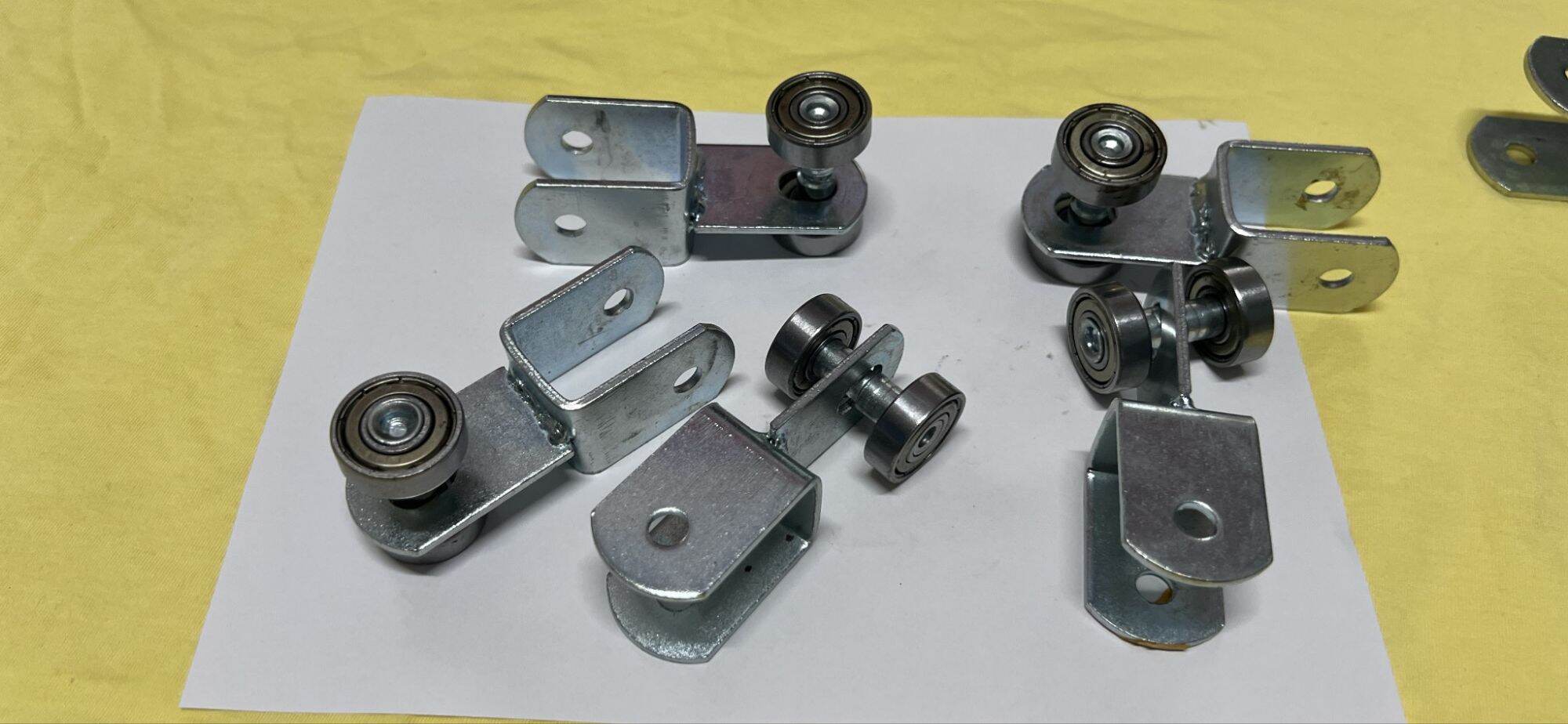 01 BÁNH XE TREO LÙA MÁI XẾP - BÁNH XE LÙA TREO BẠT-Treo lùa cửa sắt..