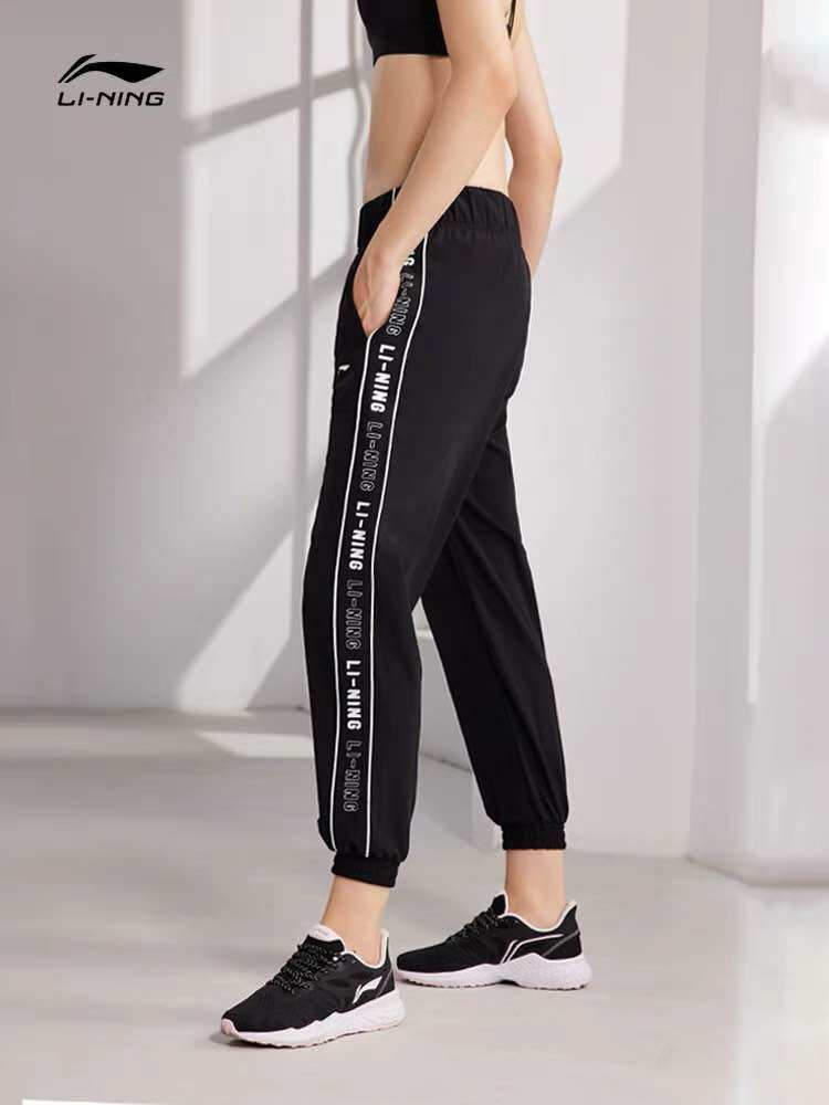 Quần gió nữ Lining AYKR136