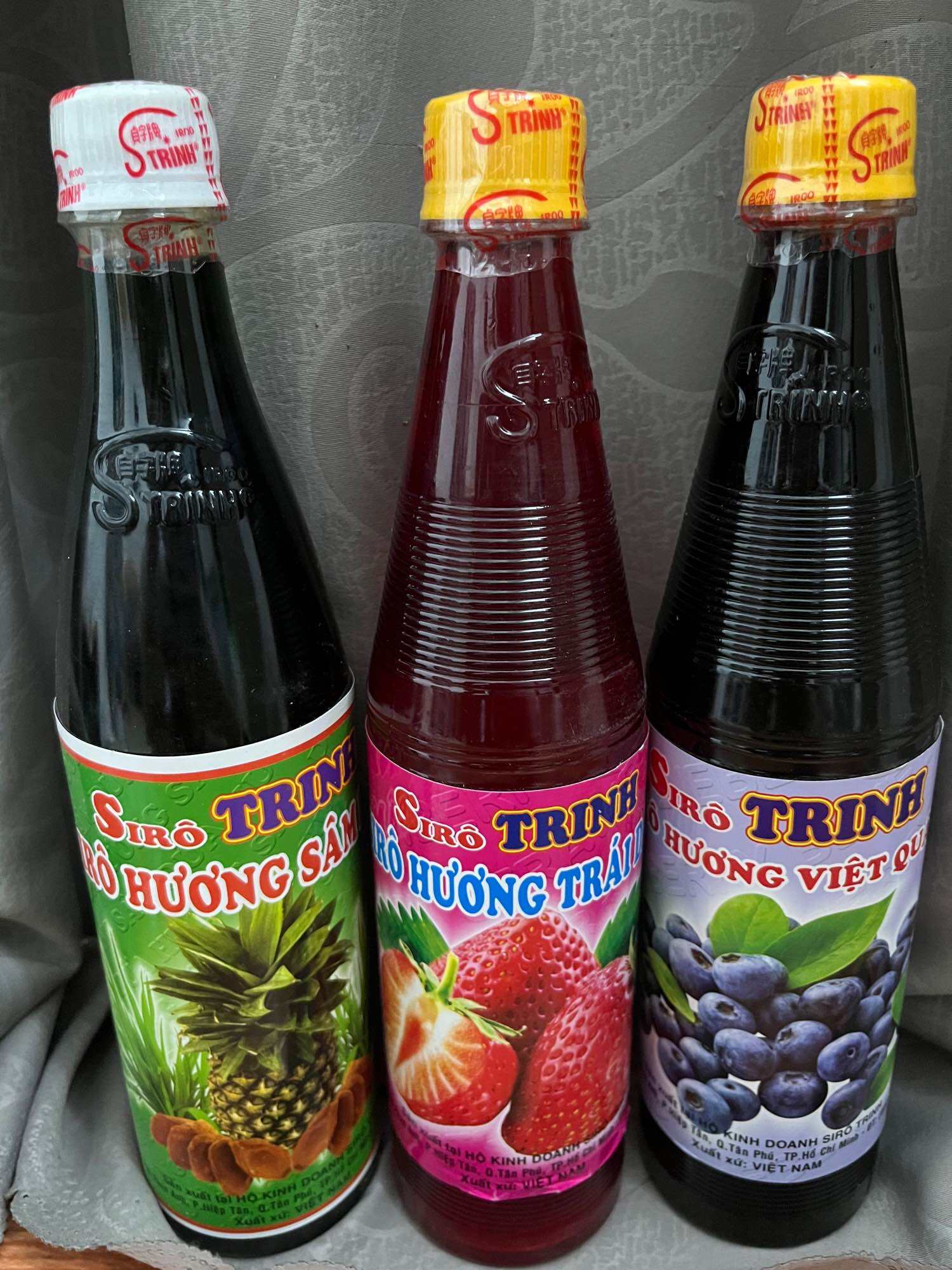 Siro Trinh chai 600ml nhiều hương - đào, dâu, vải, việt quất, sâm dứa