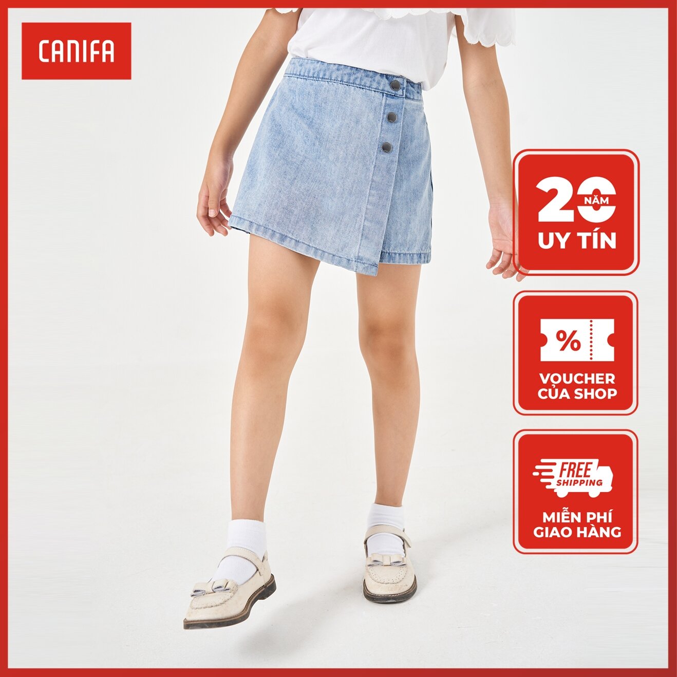 Quần soóc bé gái canifa gái chất liệu denim tà chéo 1bs22c001