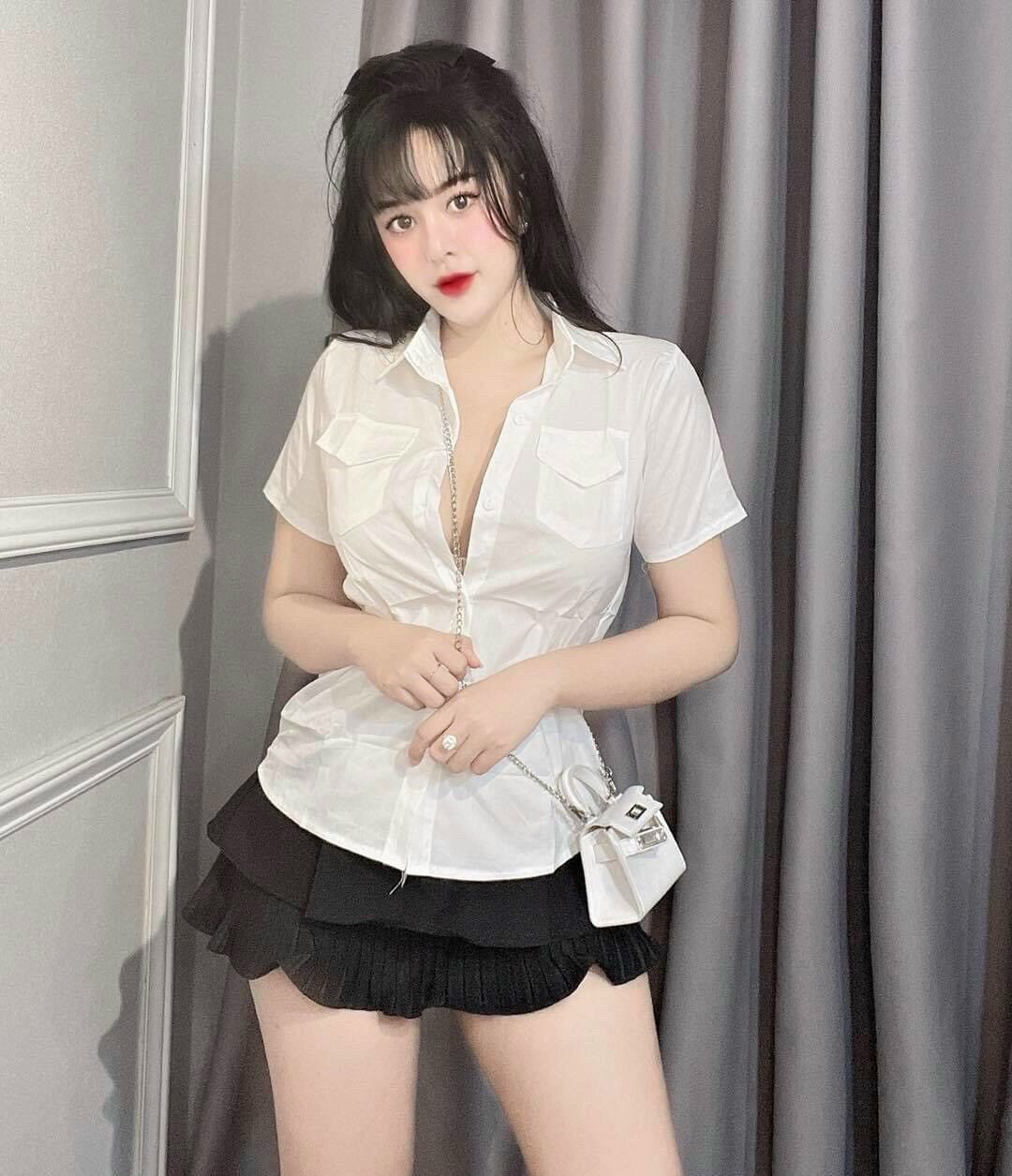 Áo sơ mi ngắn tay hai túi nắp