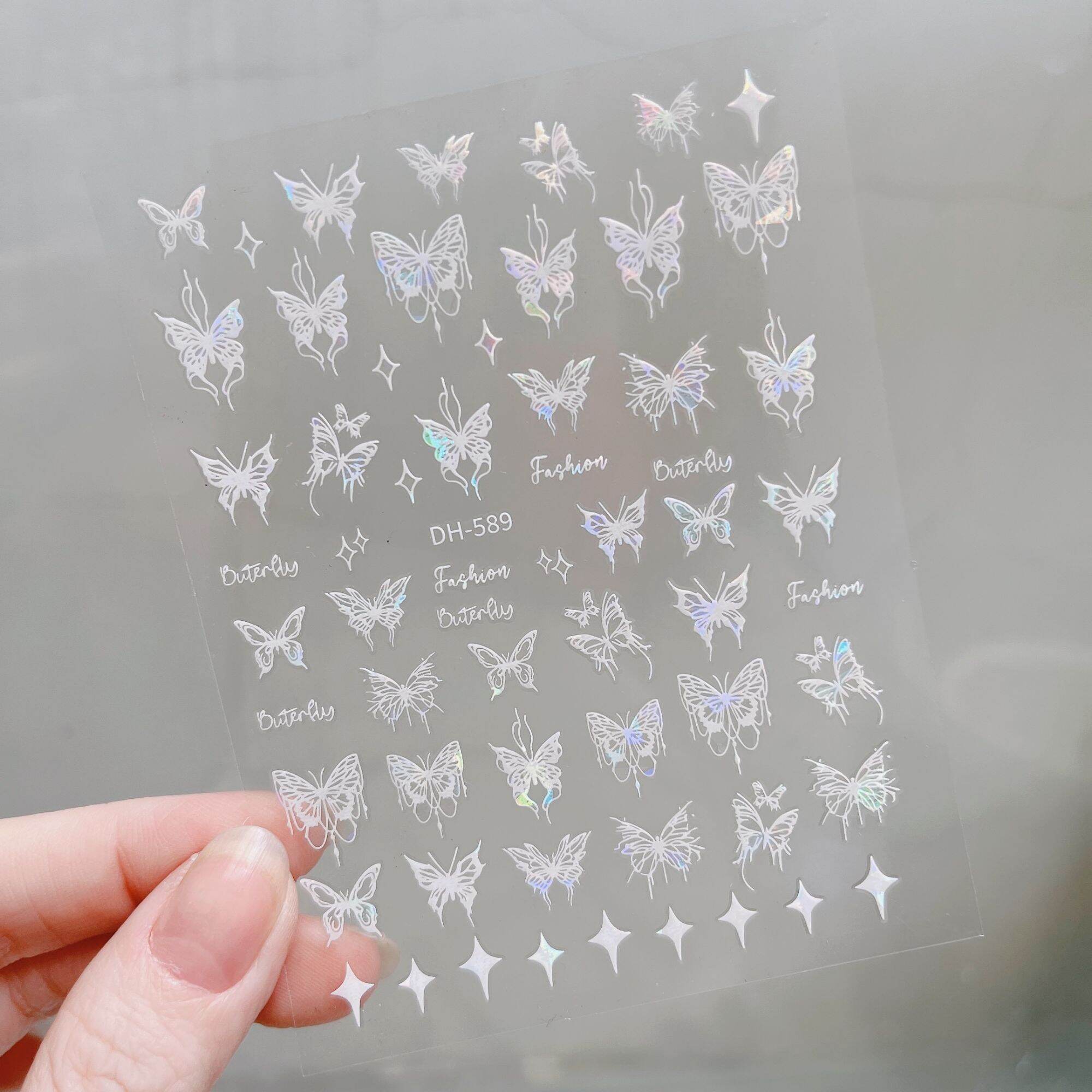 Sticker dán móng trang trí nail mẫu bướm nơ hoa