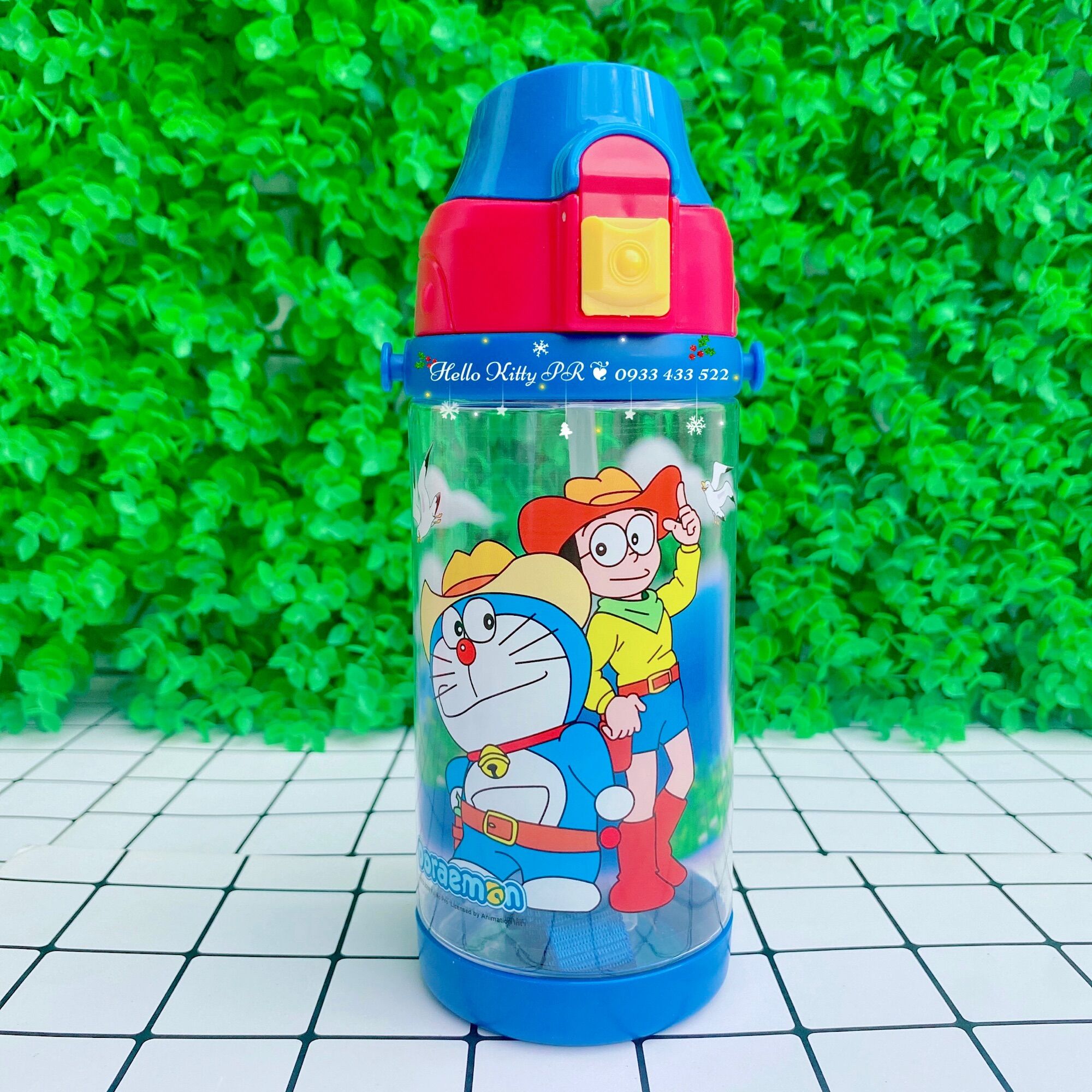 Bình nước có dây đeo Hello Kitty - Doremon Doraemon