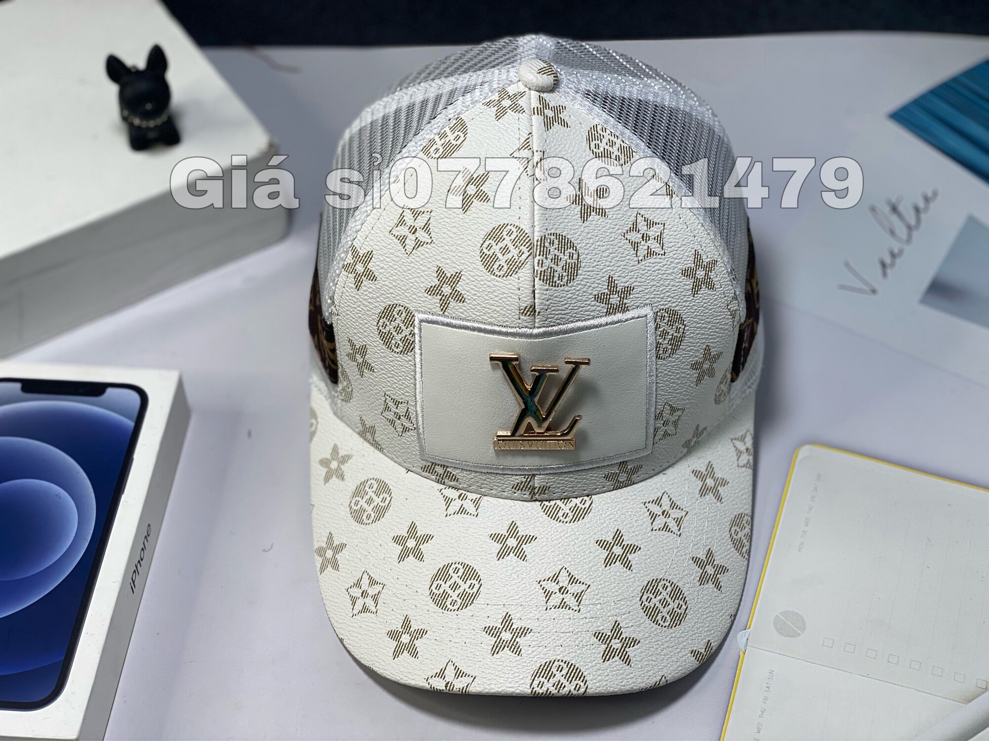 Nón kết da in bông logo sắt phối lưới thời trang