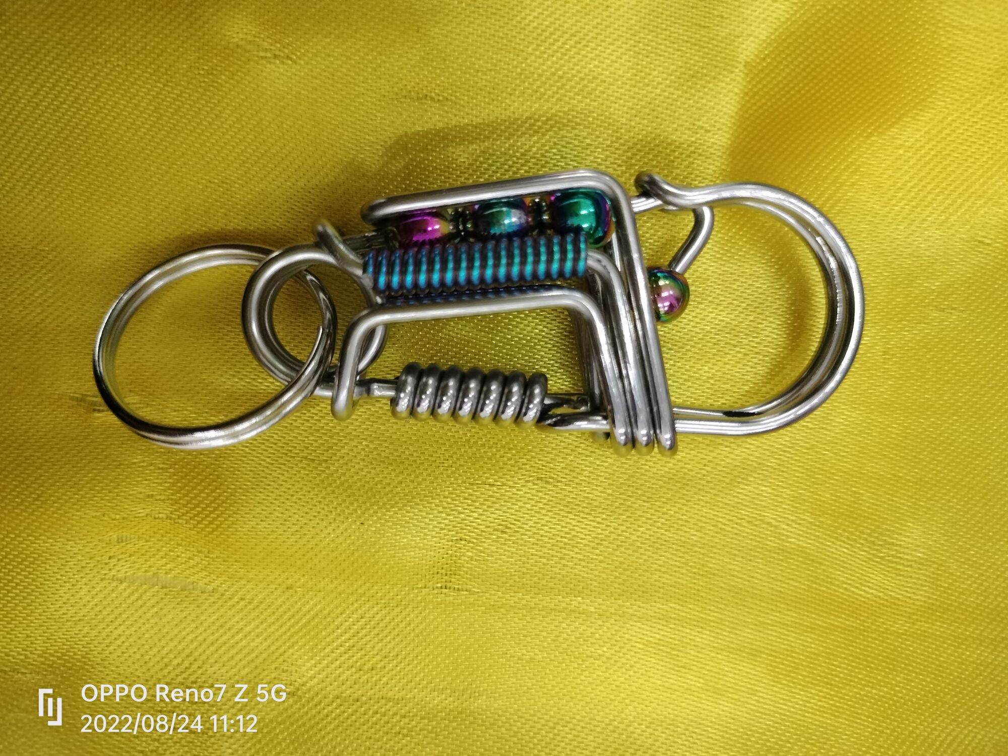 móc khóa inox phối titan.bi.đep