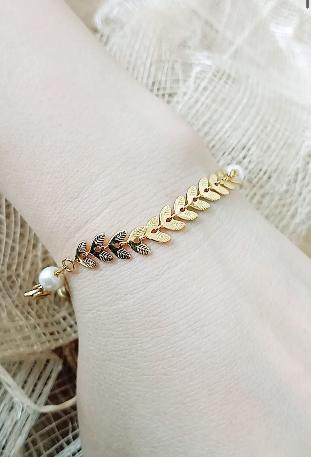 Lắc tay titan chiếc lá mạ vàng