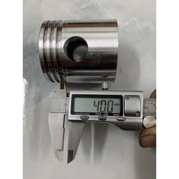 piston 60mm hitachi phay nghịch ắc
