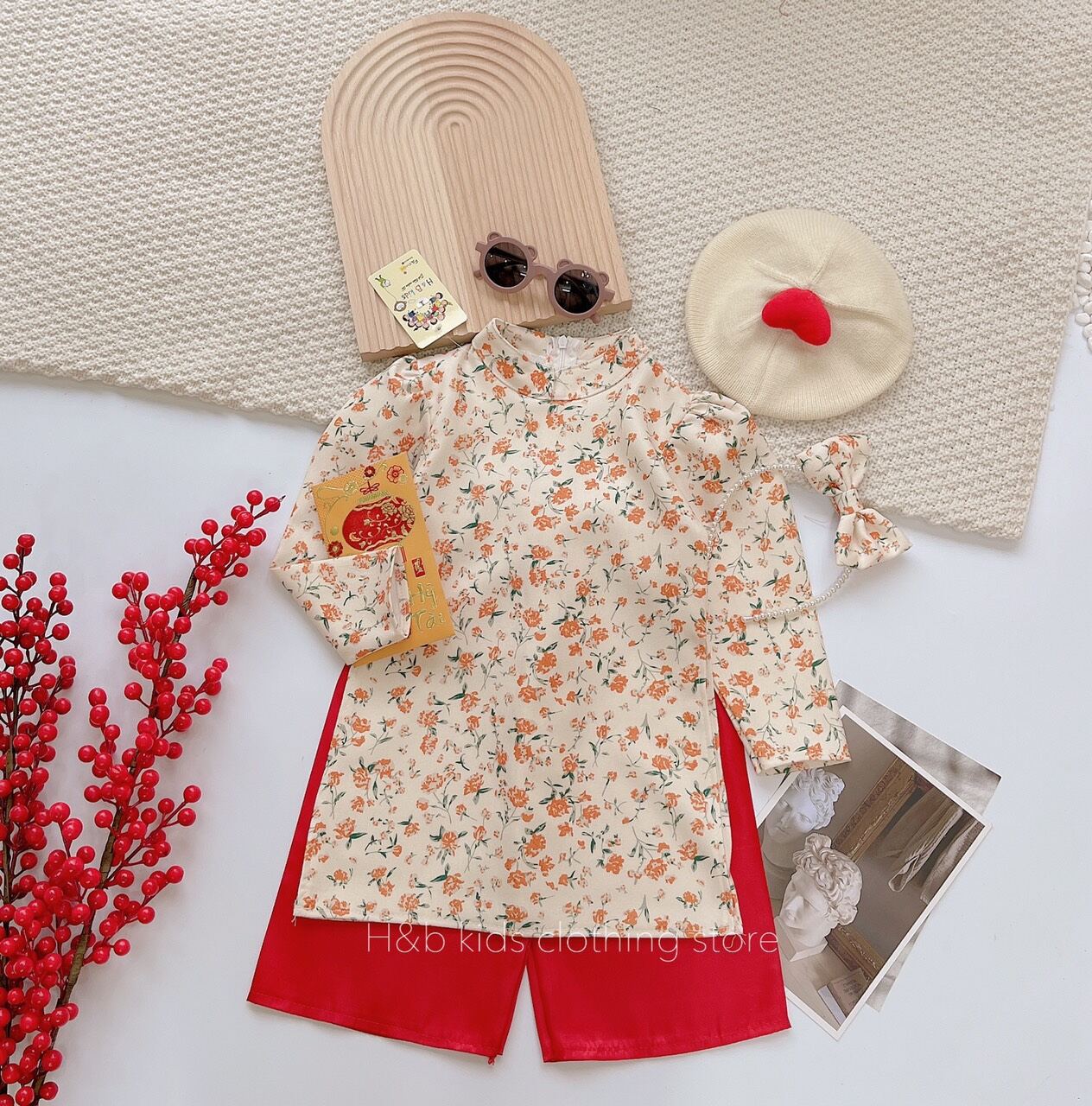 Áo dài tết cho bé gái xinh xắn kèm bờm