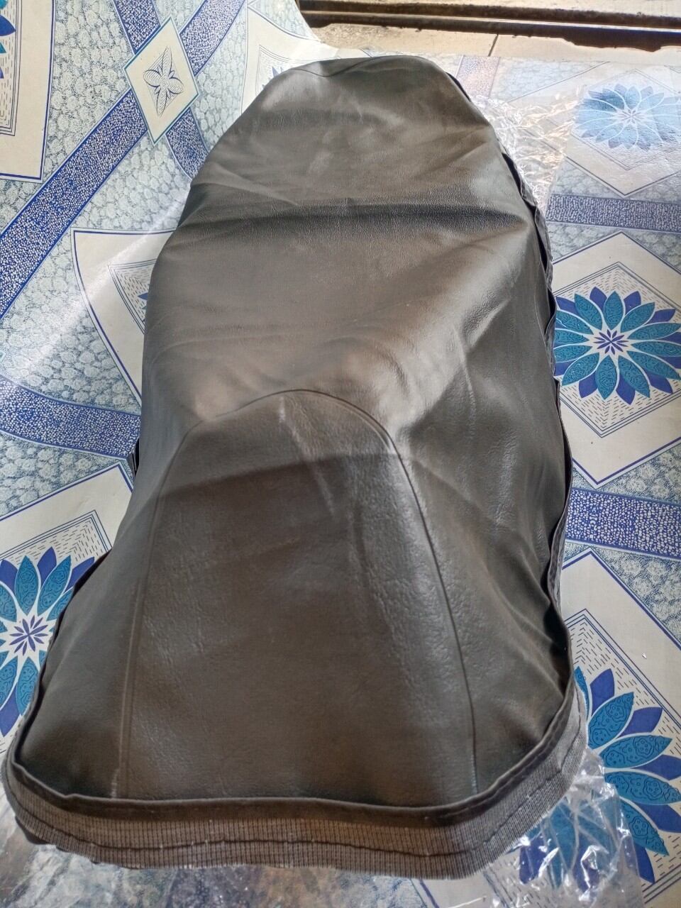 Da bọc yên xe spacy