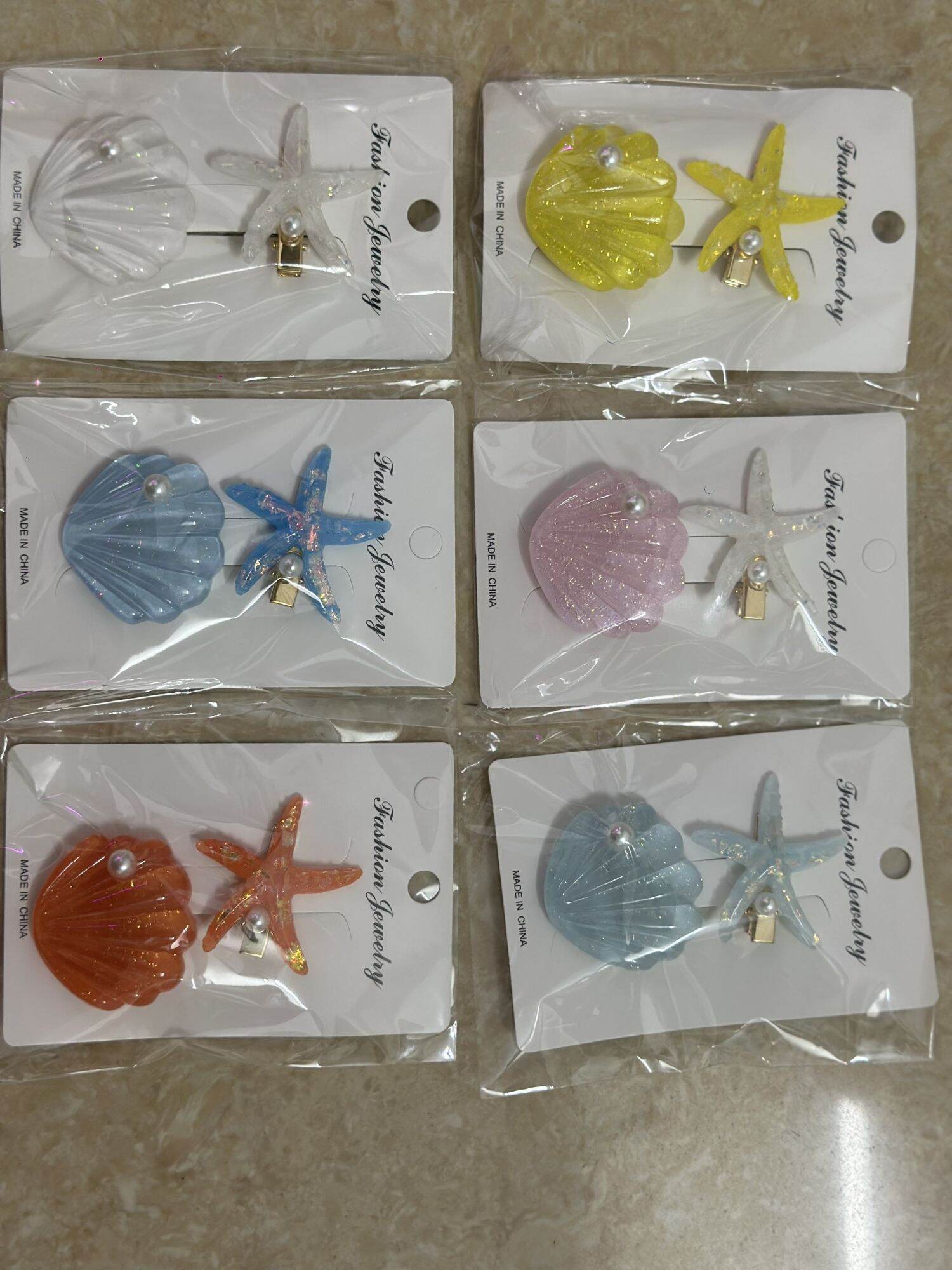 set 2 kẹp tóc,kẹp mái vỏ sò,sao biển