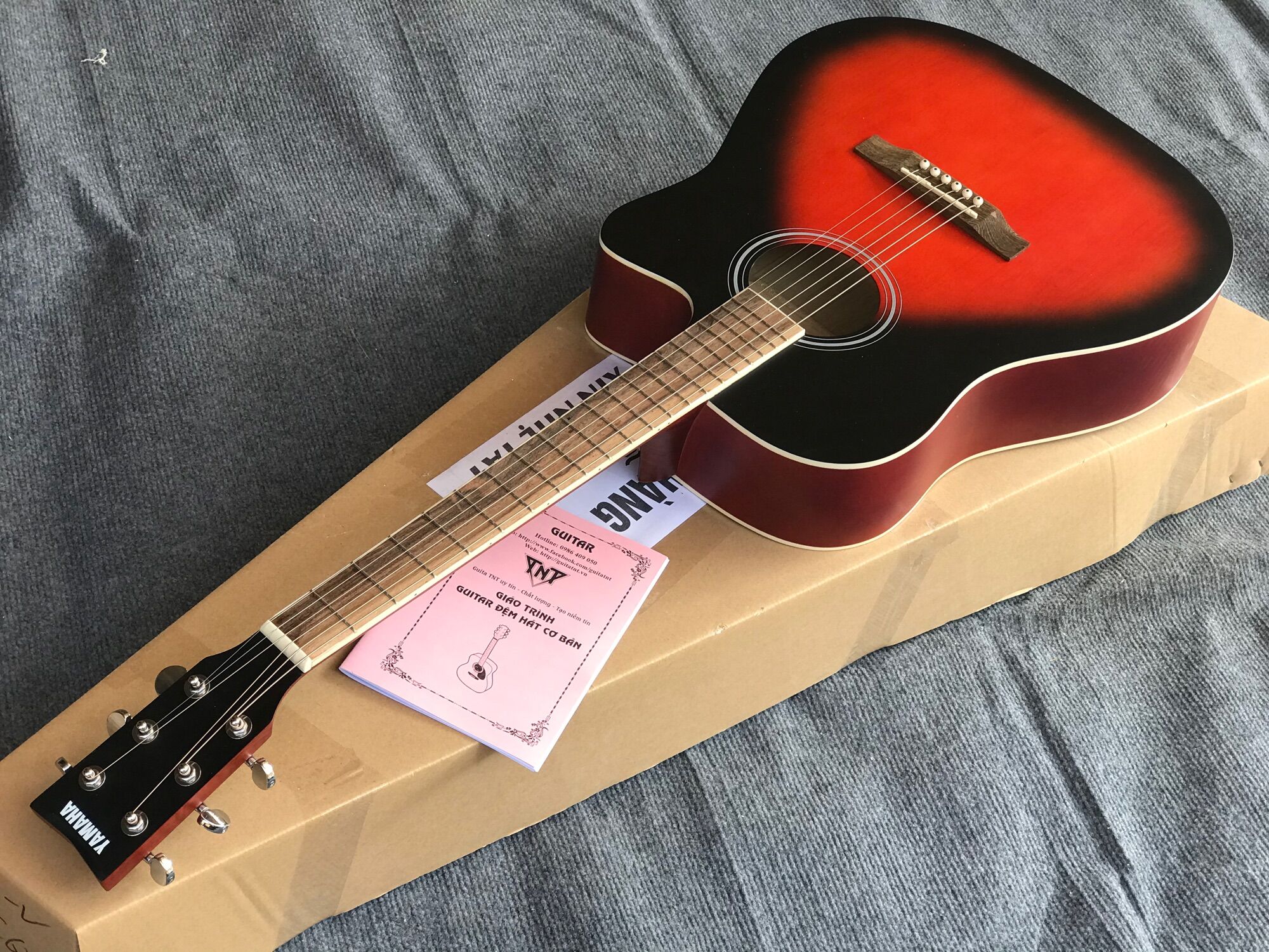 Đàn guitar yamaha fx 100