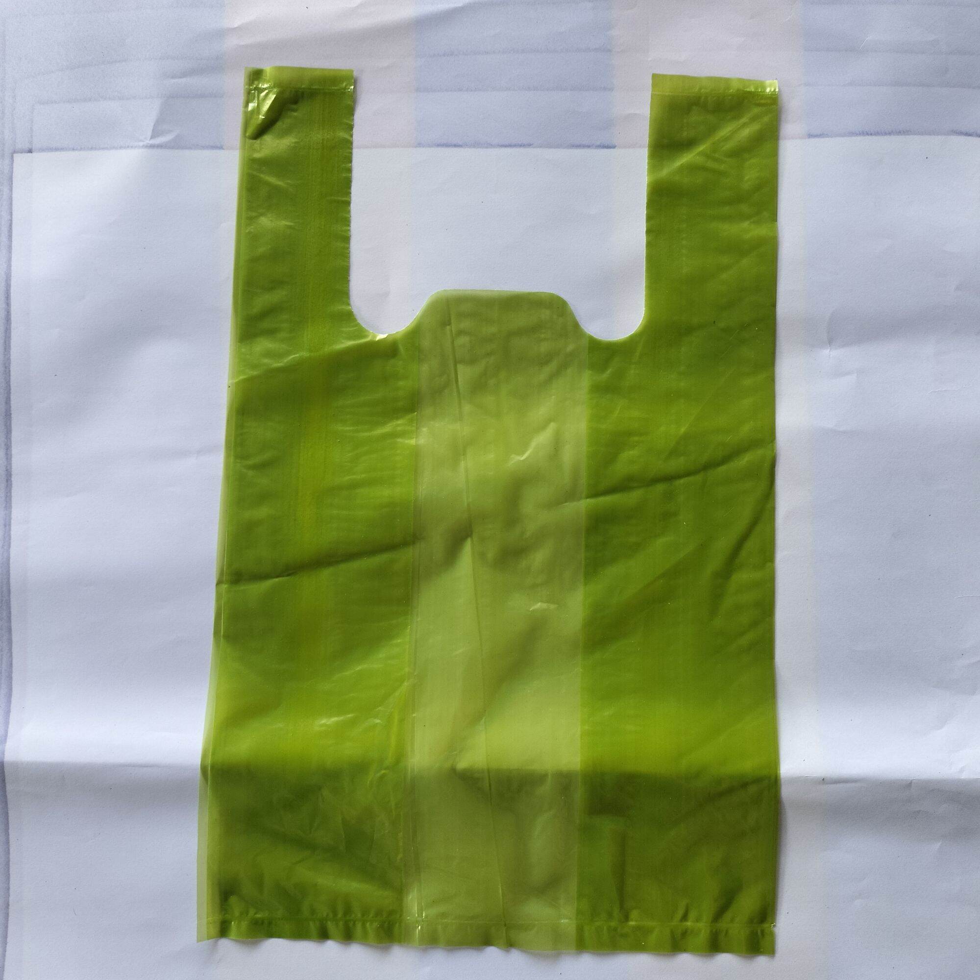 Túi xốp nilon màu mỡ có quai (1kg)