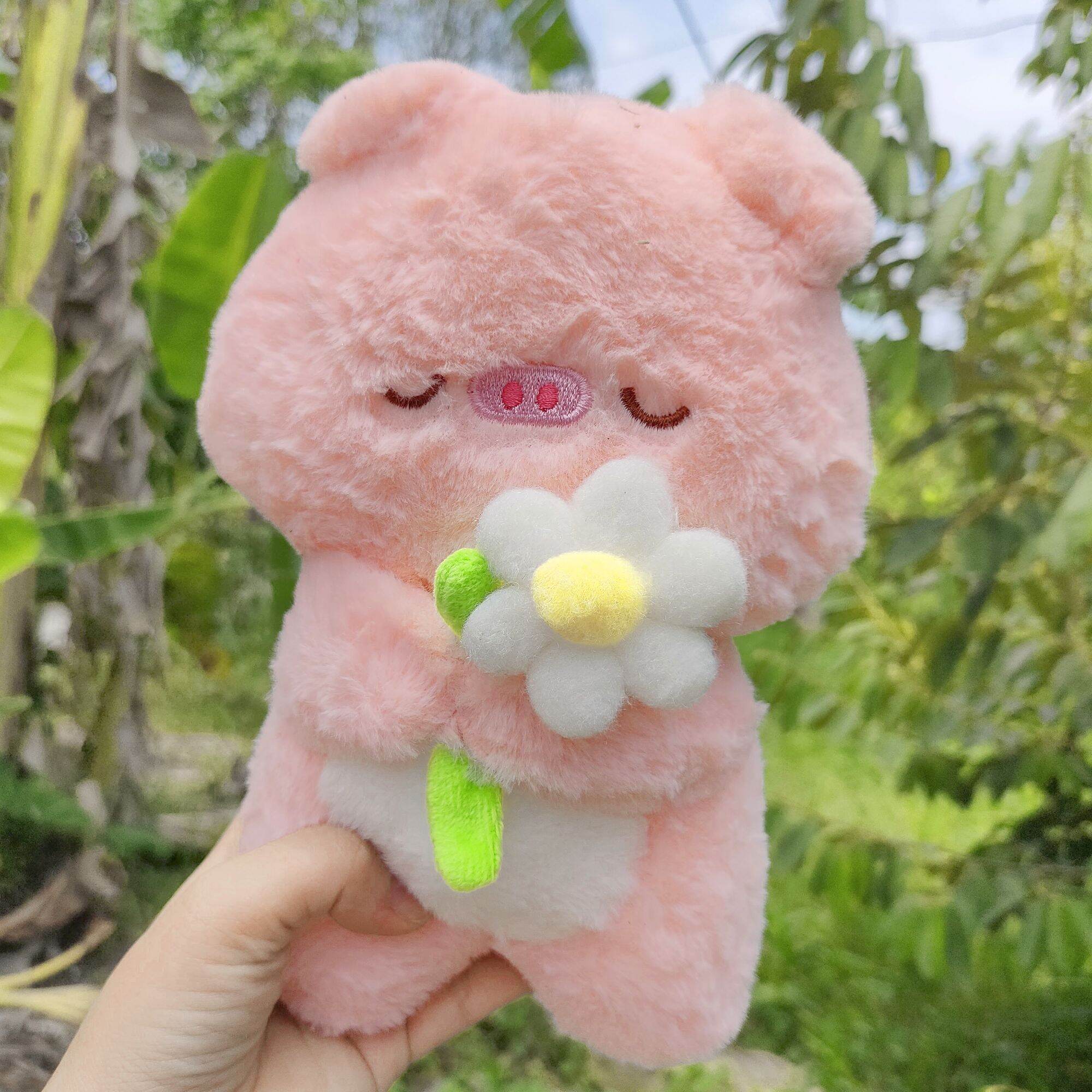 Gấu bông, thú nhồi bông Heo cầm hoa 20cm