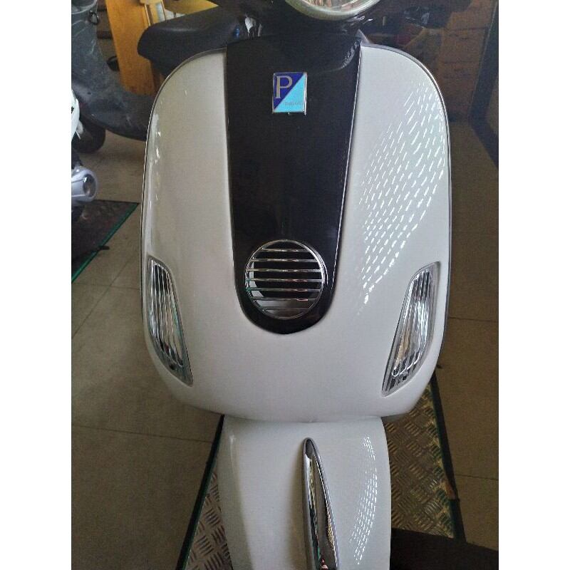 mặt kính đèn pha vespa LX