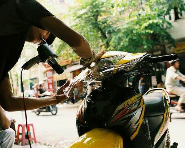 máy sấy dán decal,khò dán keo xe