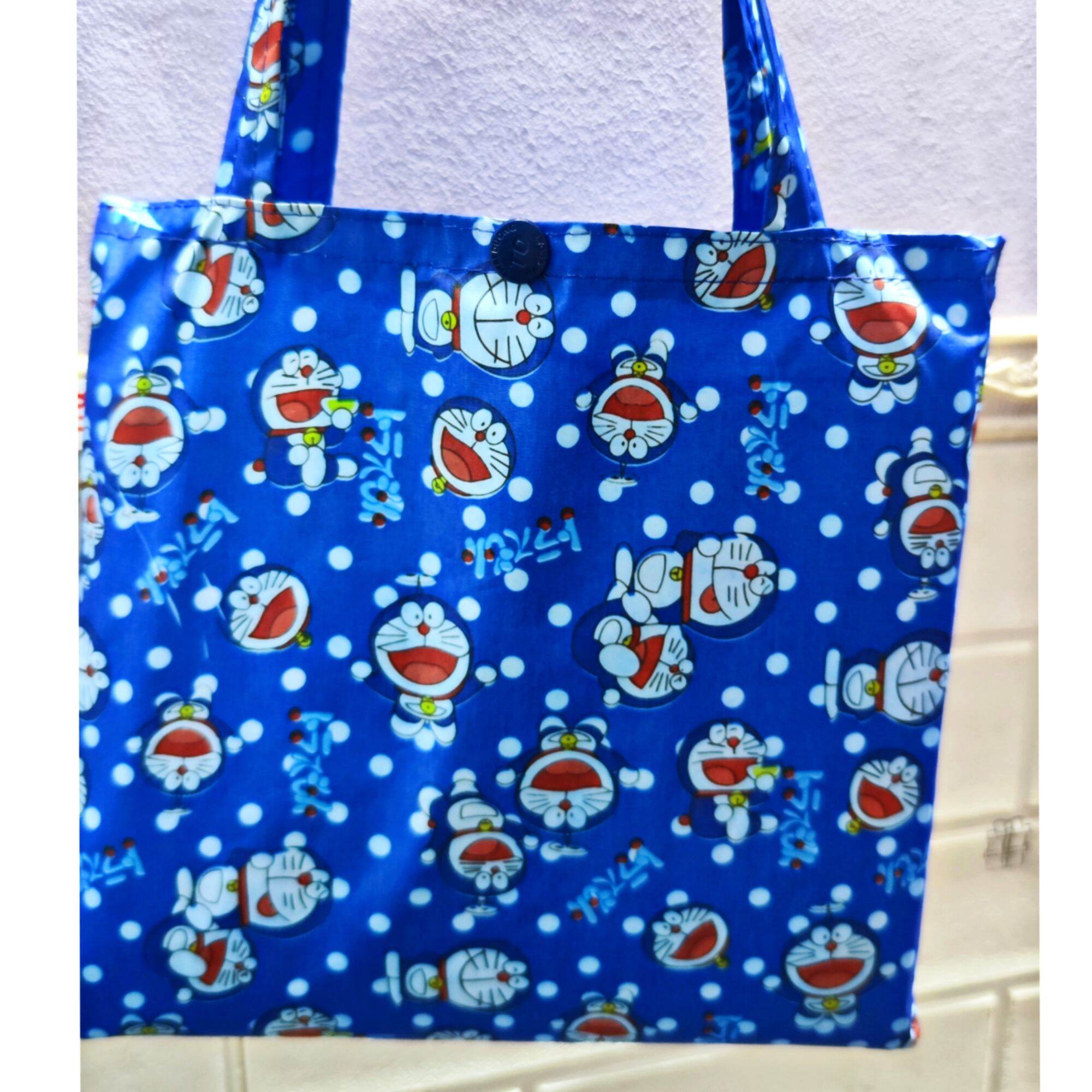 Áo mưa bít vải dù hình thú DORAEMON dễ thương