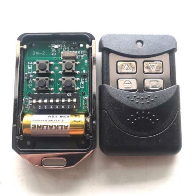 Remote điều khiển cửa cuốn có 8 mã gạt tần số 433 sóng xa khỏe