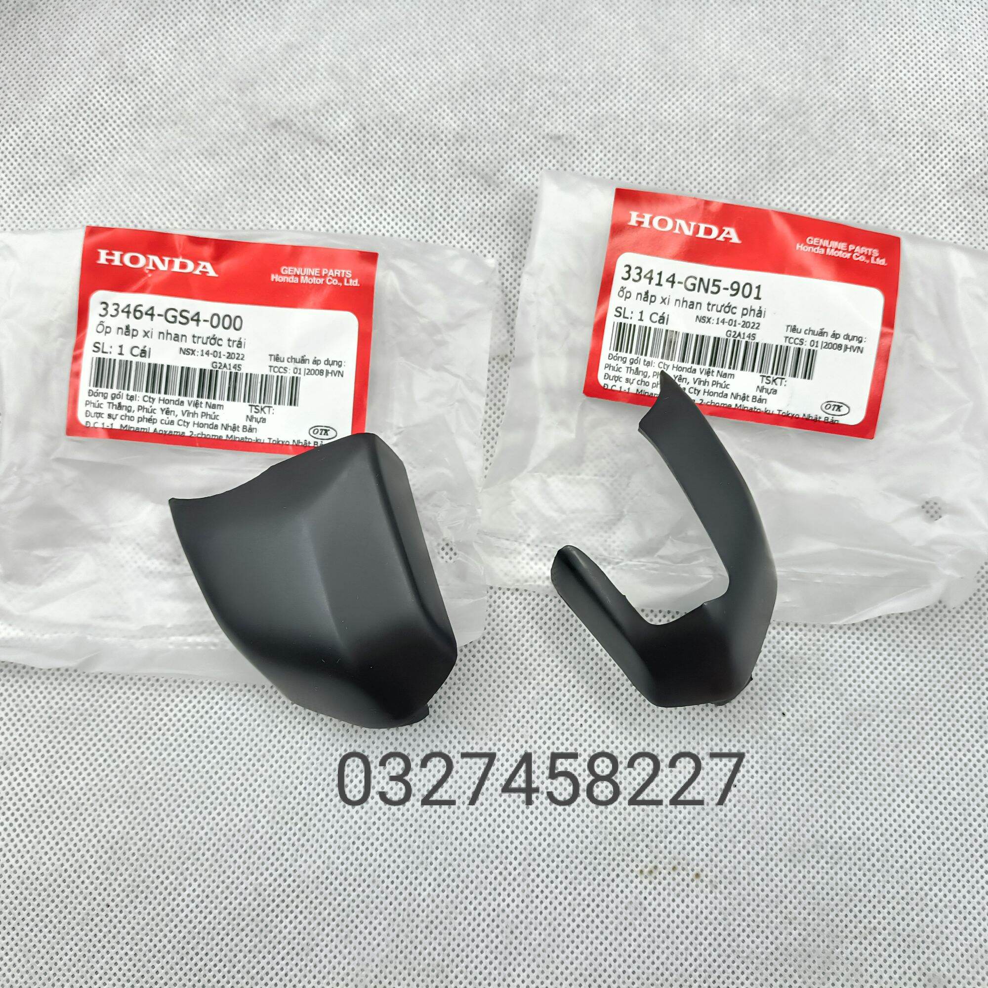 Cặp nắp nhựa, ốp đèn xi nhan trước xe DREAM zin Honda
