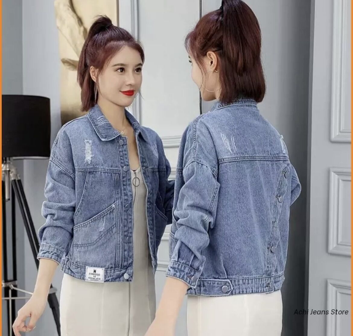 Áo khoác jean lửng nữ xanh nhạt tay dài phối nút xéo sau lưng